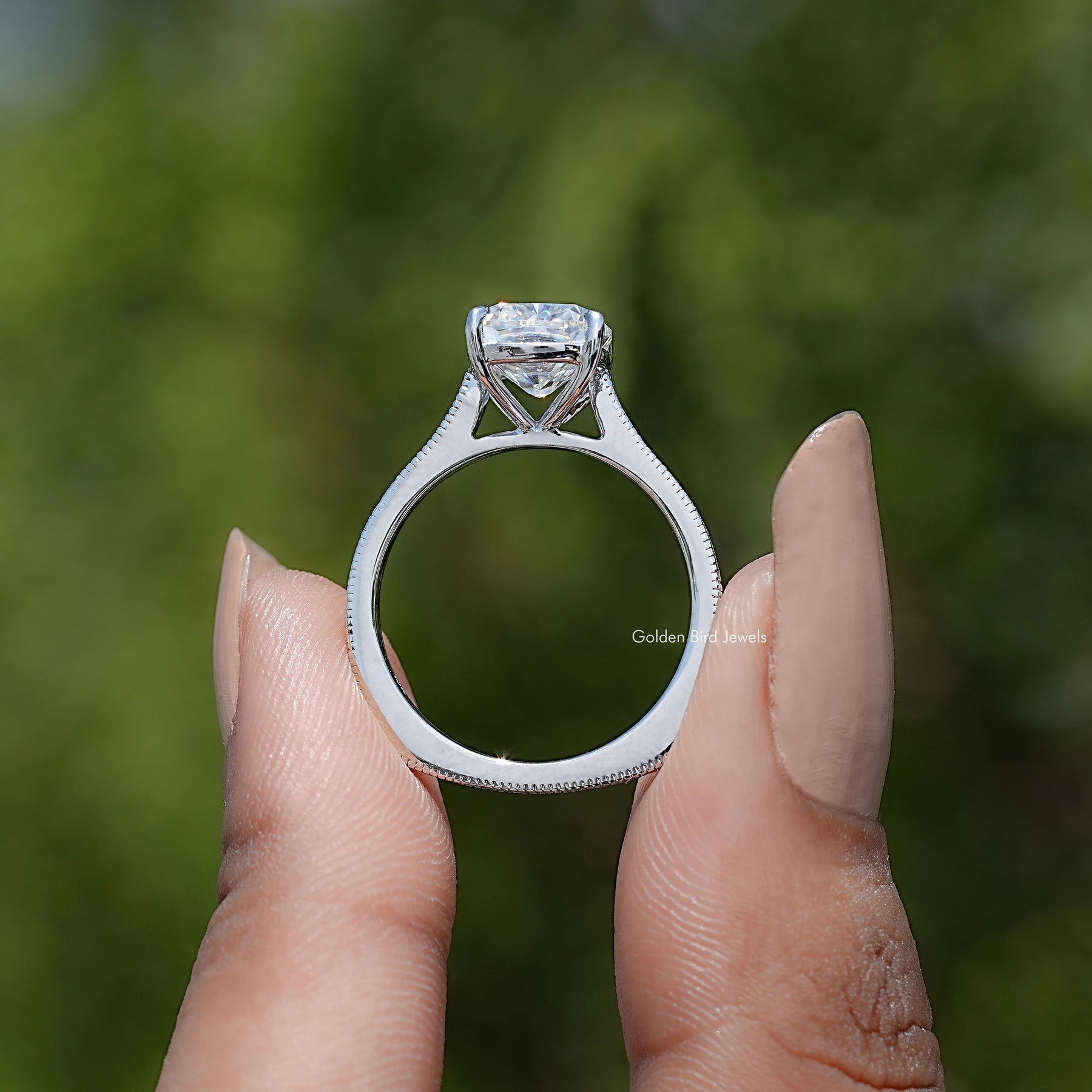 Back view of Elongated Cushion Cut Solitaire Ring in secure setting