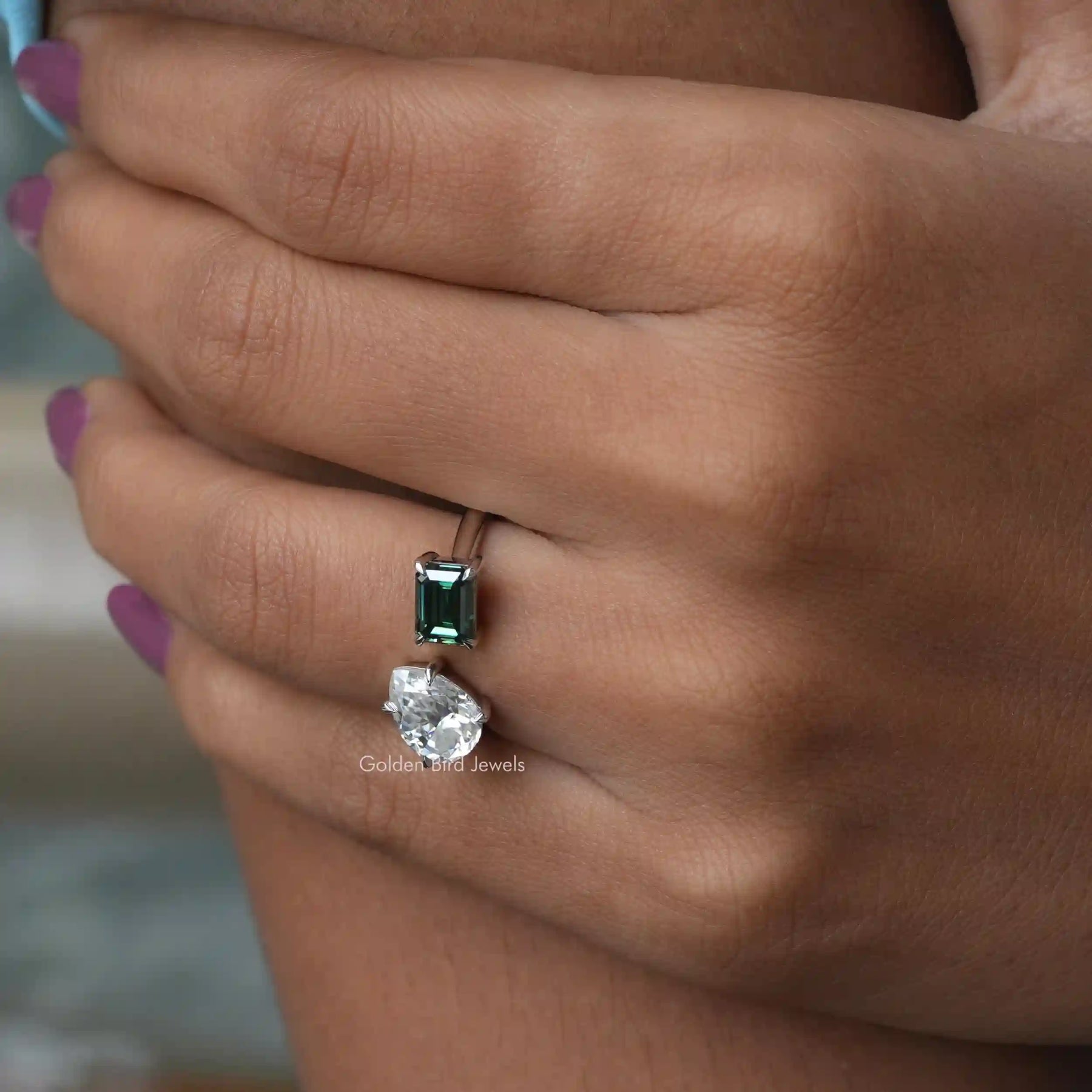 Close view of in Finger a 2 Stone Moissanite Open Ring