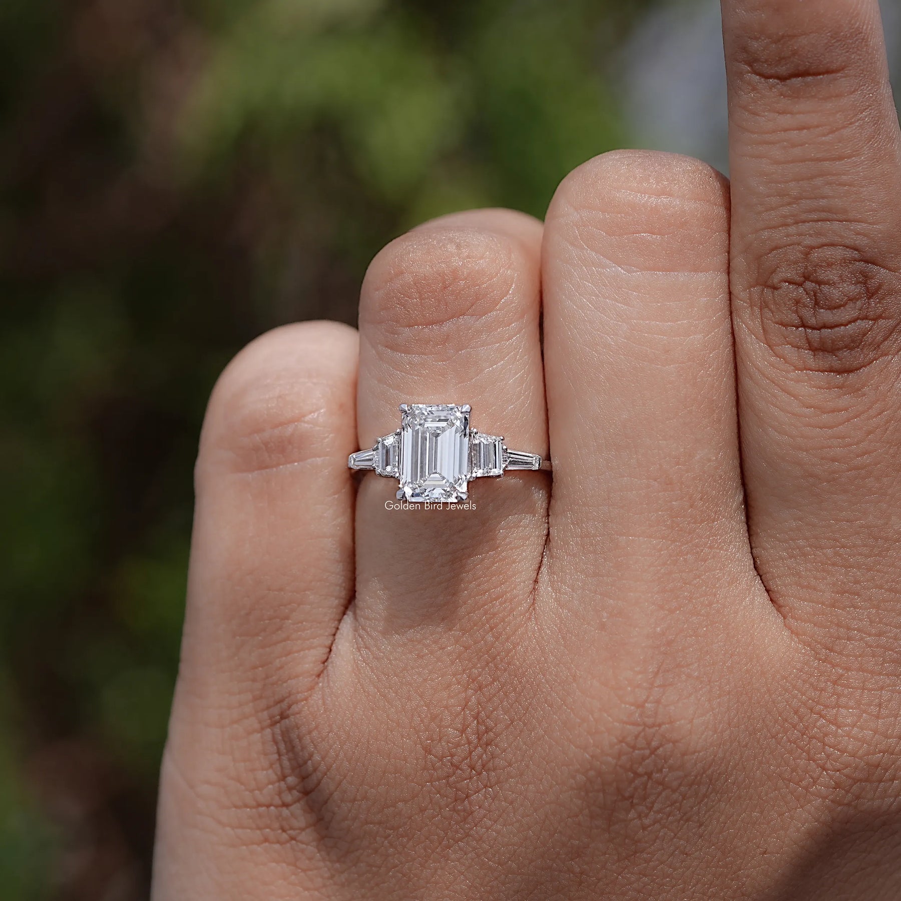 Top view of Emerald And Tapered Baguette Lab Diamond Ring