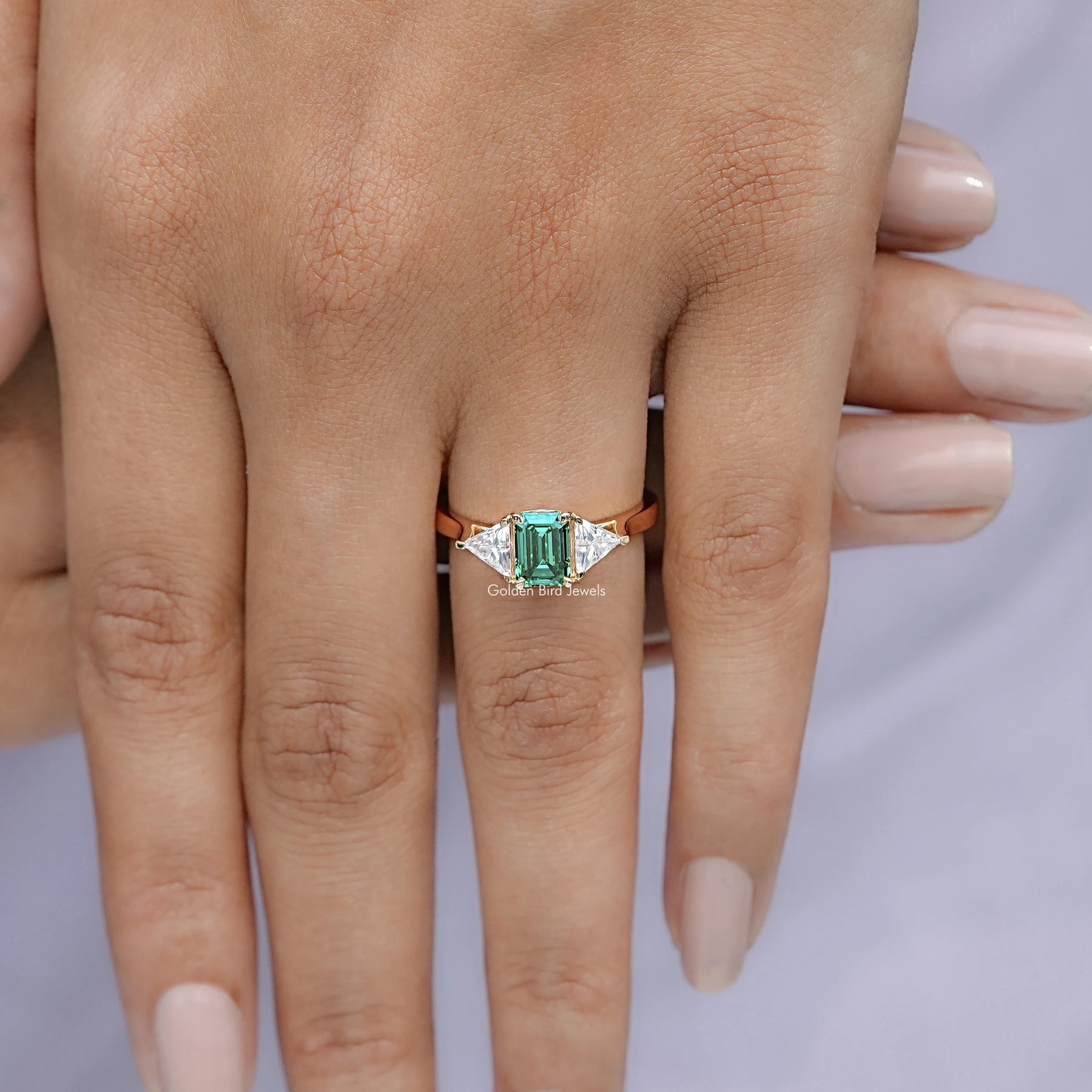 Emerald And Triangle Moissanite Three Stone Ring