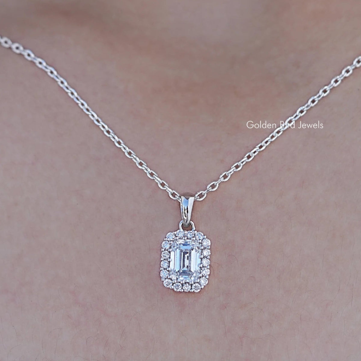 Close up view of Emerald Cut Lab Grown Diamond Halo Pendant
