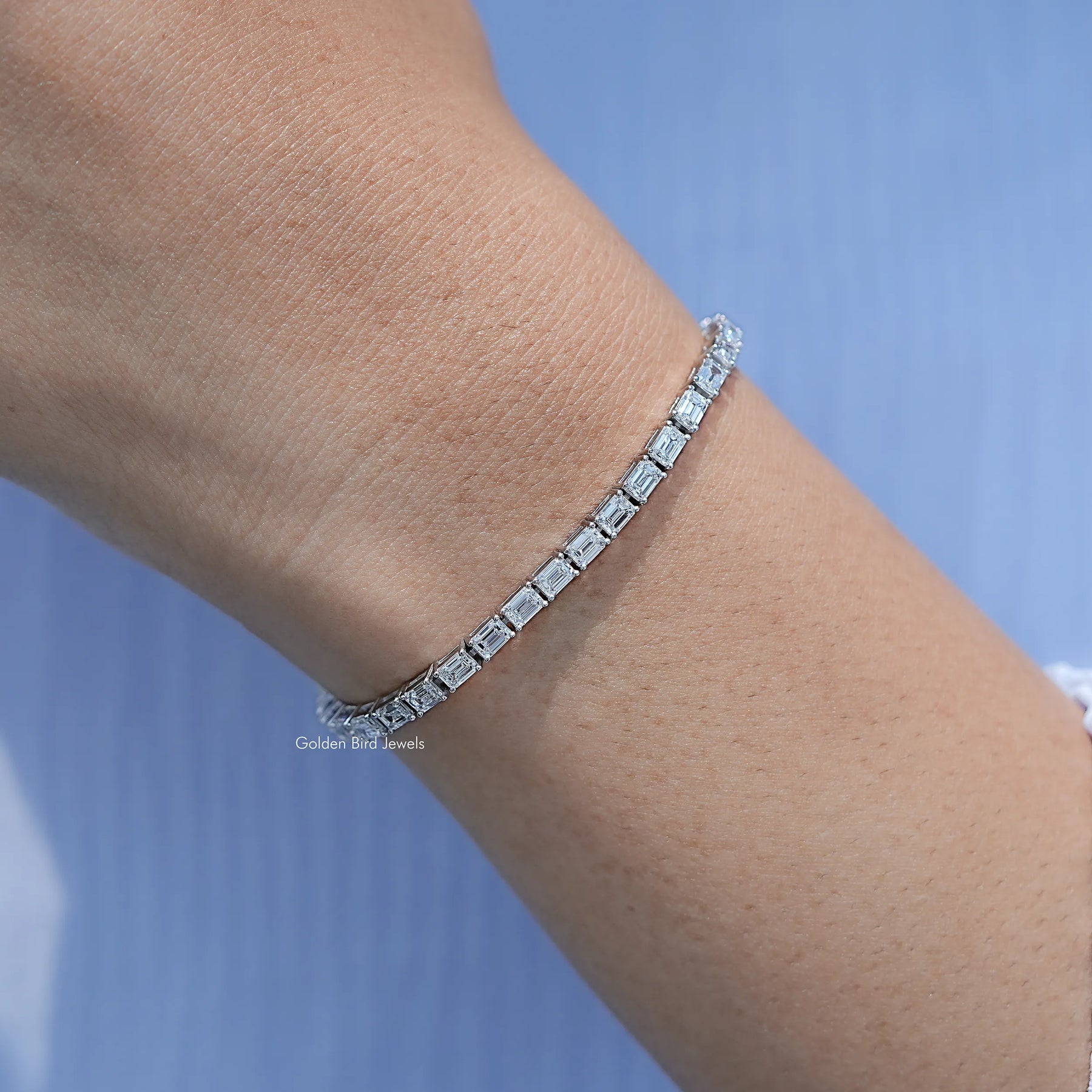 In hand Showing View Emerald Cut Diamond Tennis Steel Bracelet
