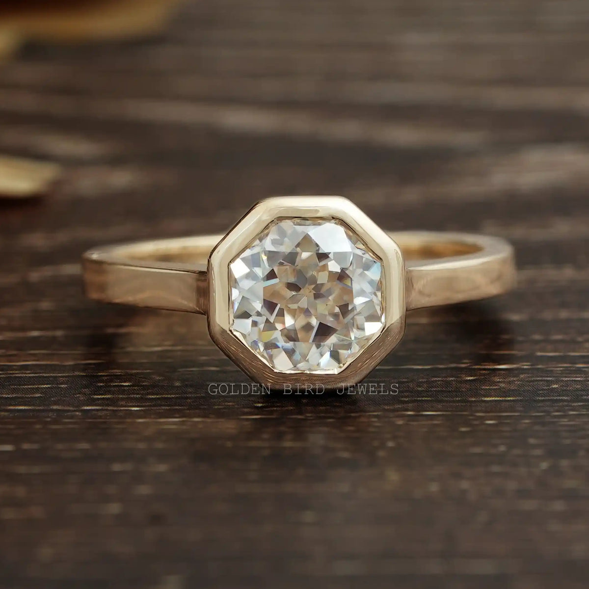 Octagon_Cut_Moissanite_Solitaire_Bezel_Set_Engagement_Ring