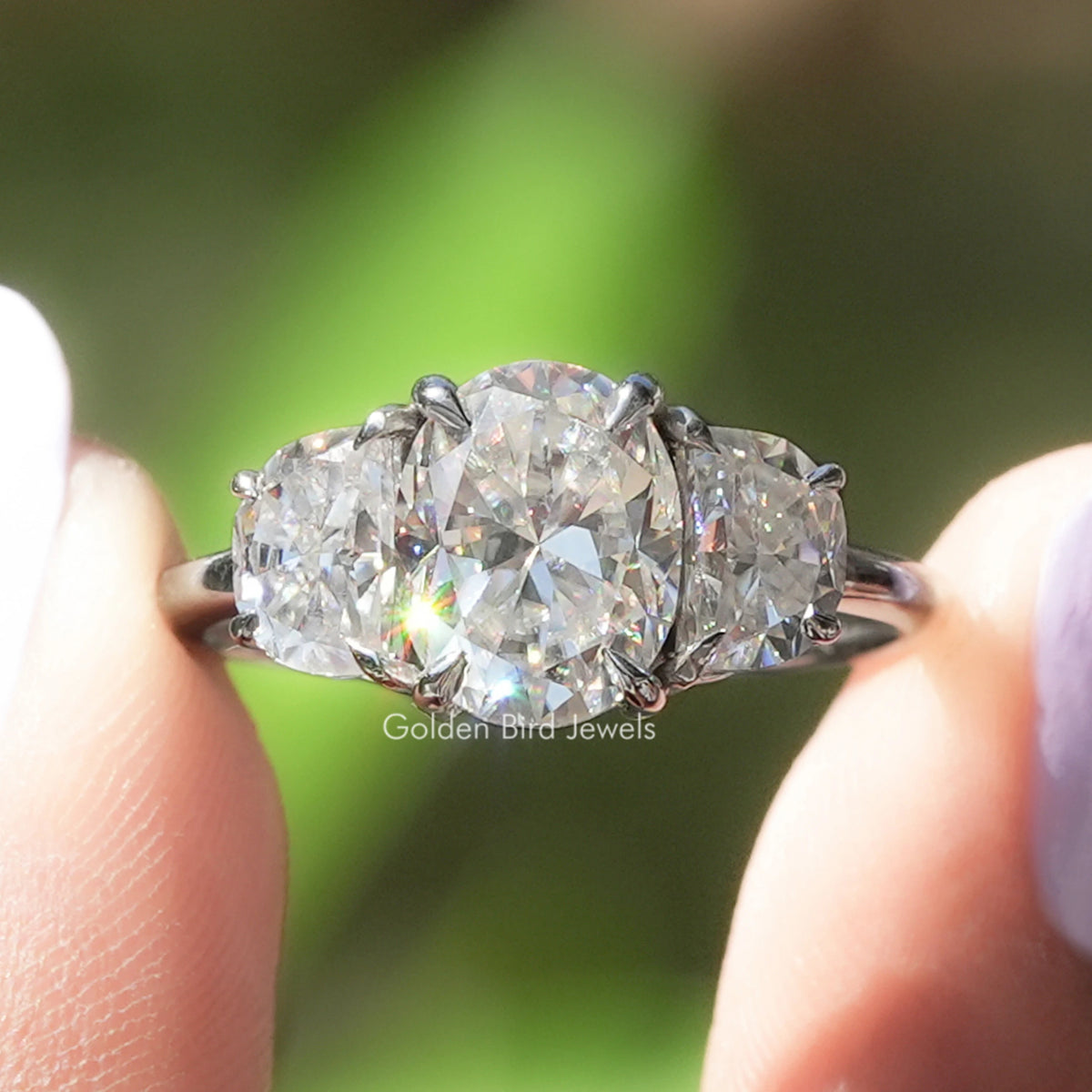 Oval And Half Moon Three Stone Moissanite Ring