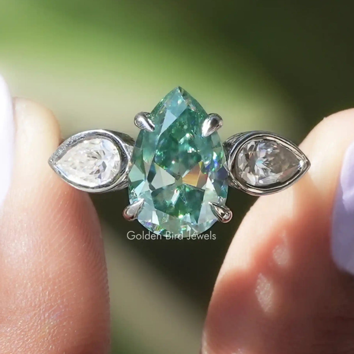 Old Mine Pear Cut Moissanite Three Stone Ring