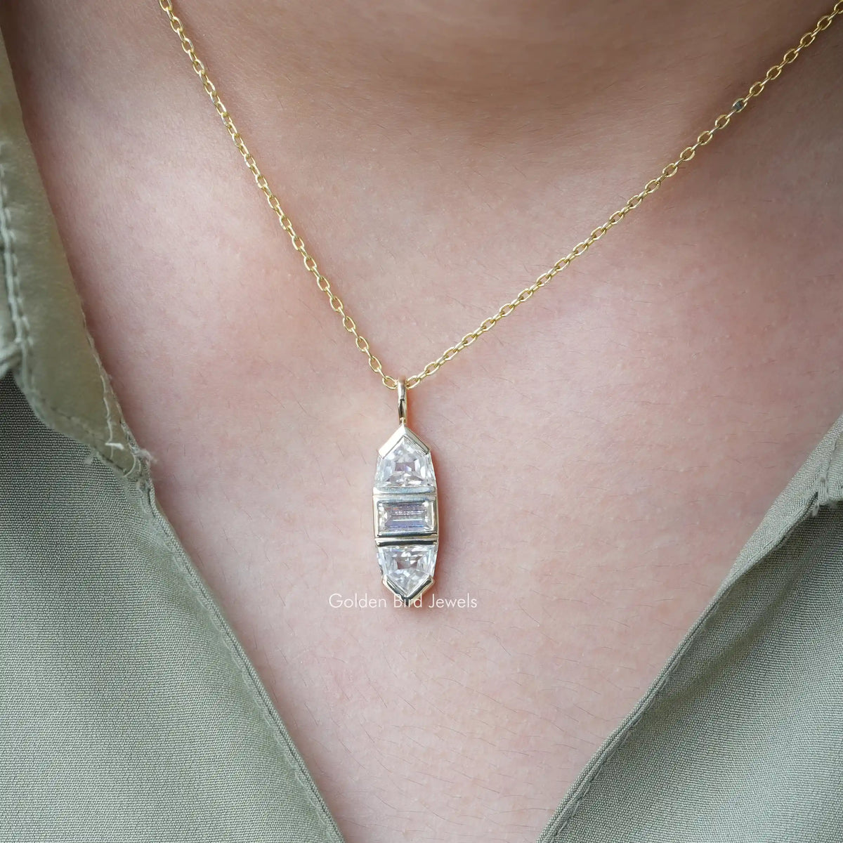In neck front view of baguette and bullet cut moissanite pendant