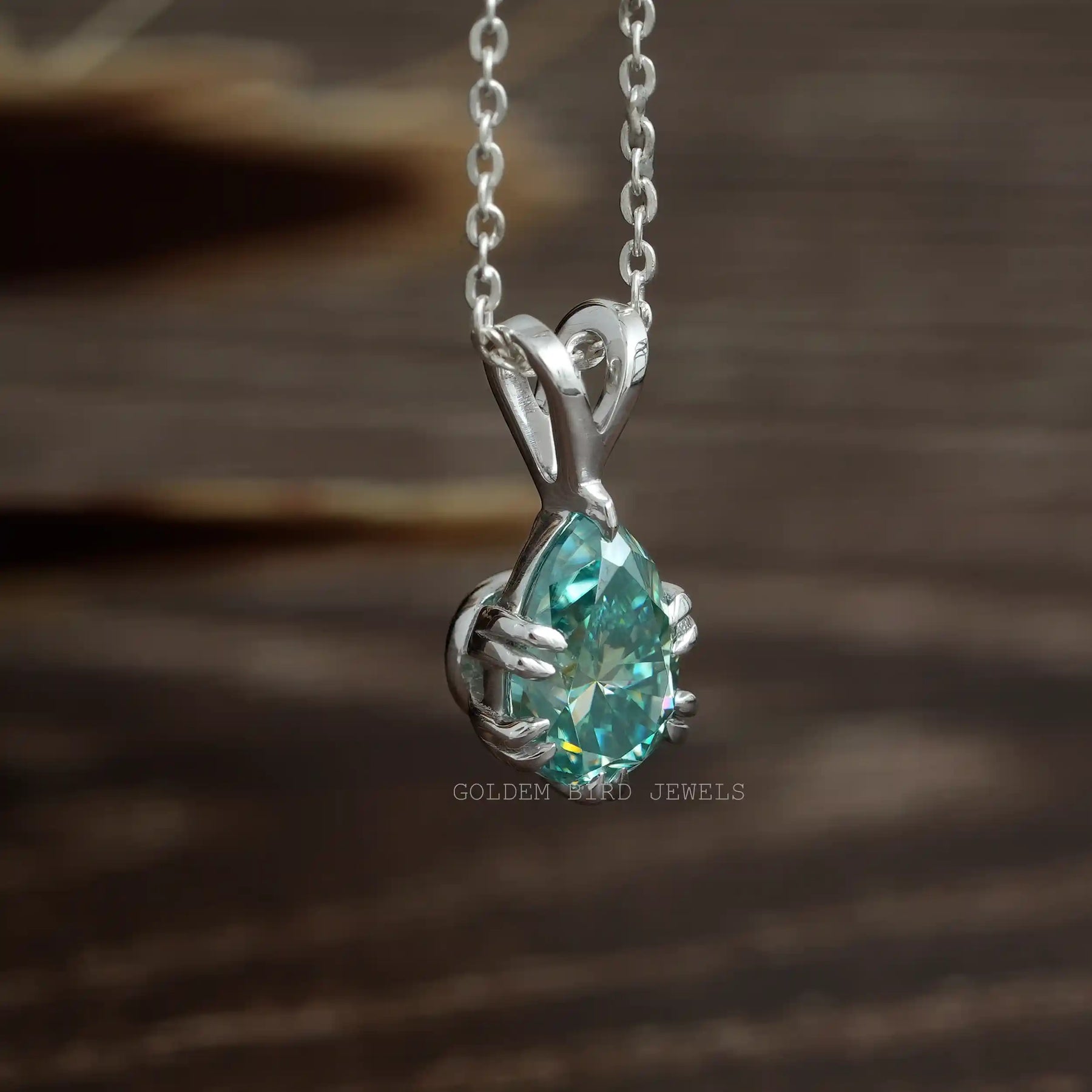 Close view of moissanite chain bracelet in a secure setting