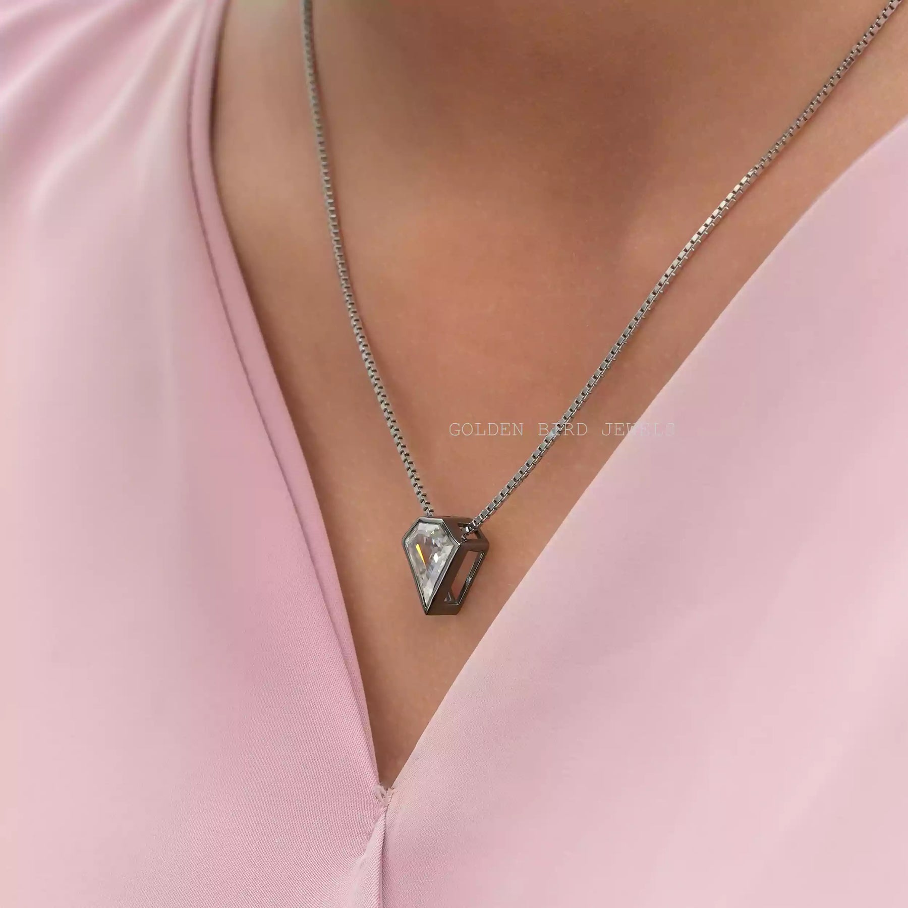 In neck front view of pentagon cut moissanite pendant