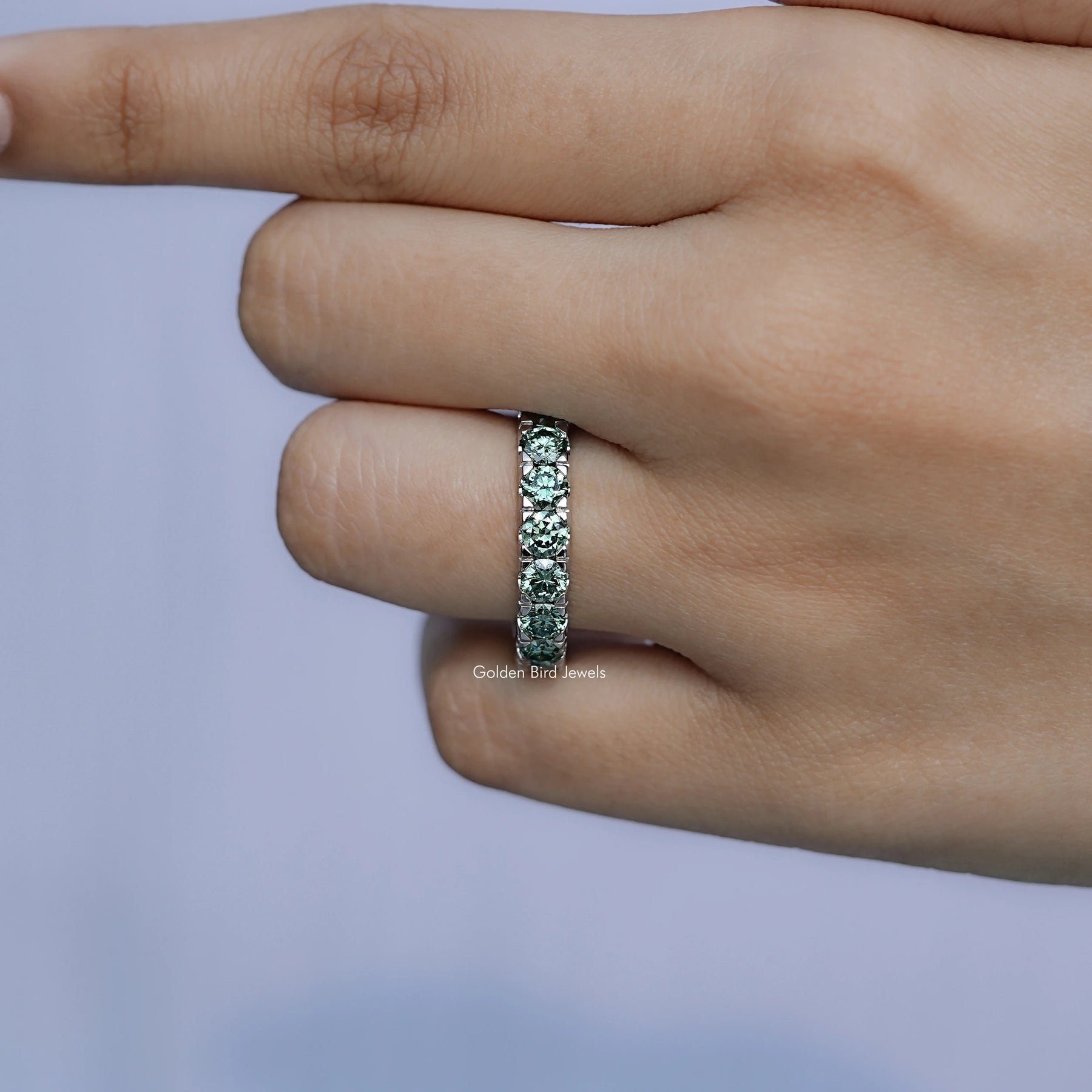View of Green Round Cut Moissanite Eternity Band
