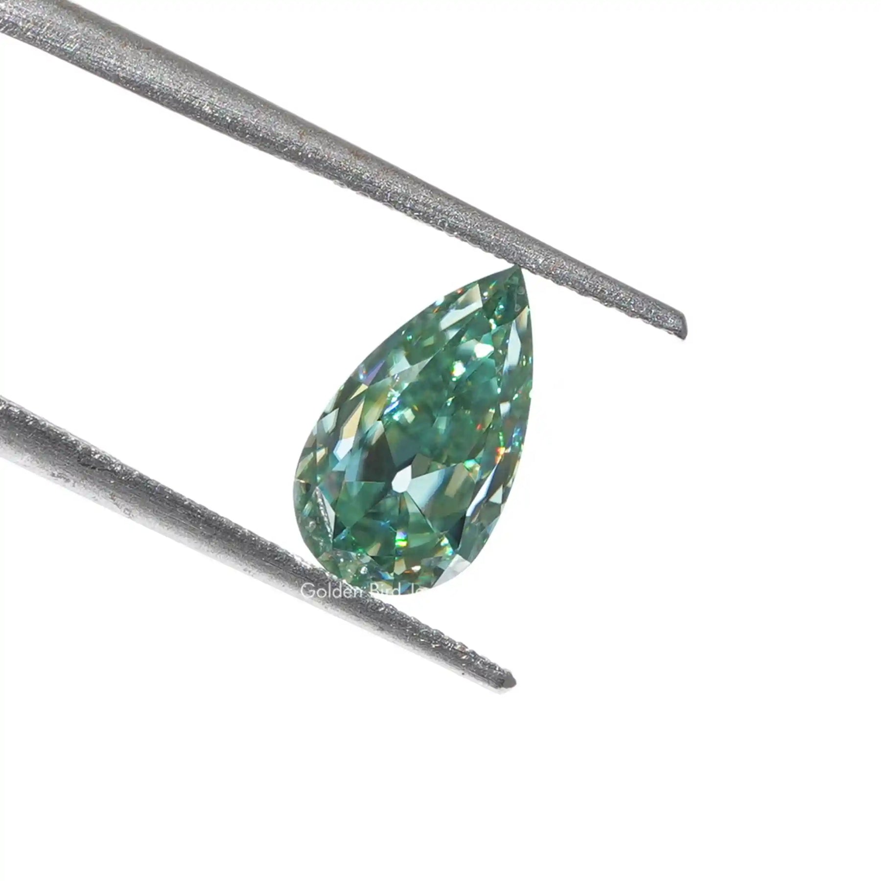Old Mine Pear Loose Moissanite Stone in blue green color