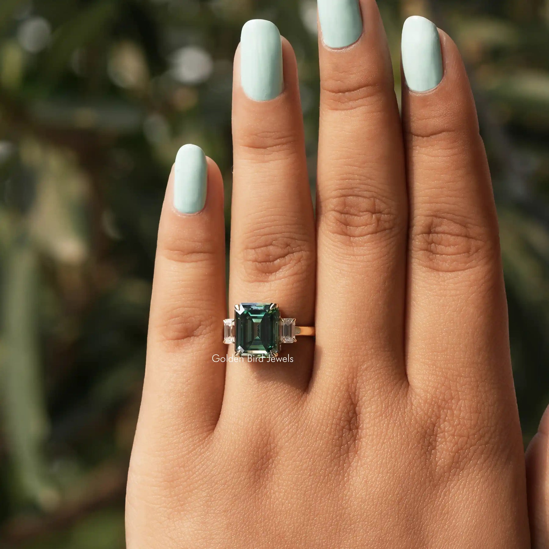 Detailed View Of Moissanite 3 Stone Emerald Cut Ring In White Gold
