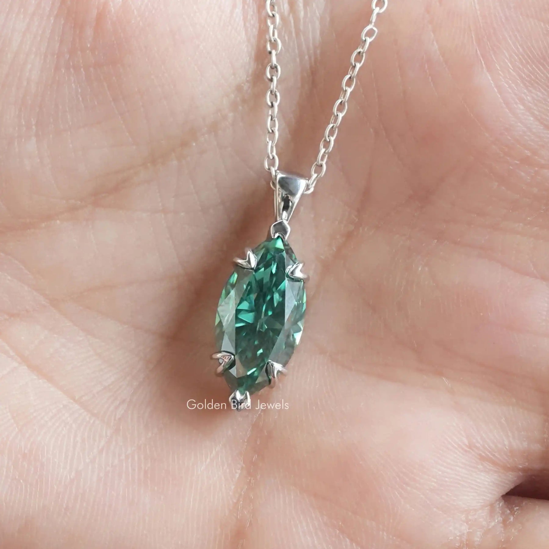 Close view of moissanite chain bracelet in a secure setting