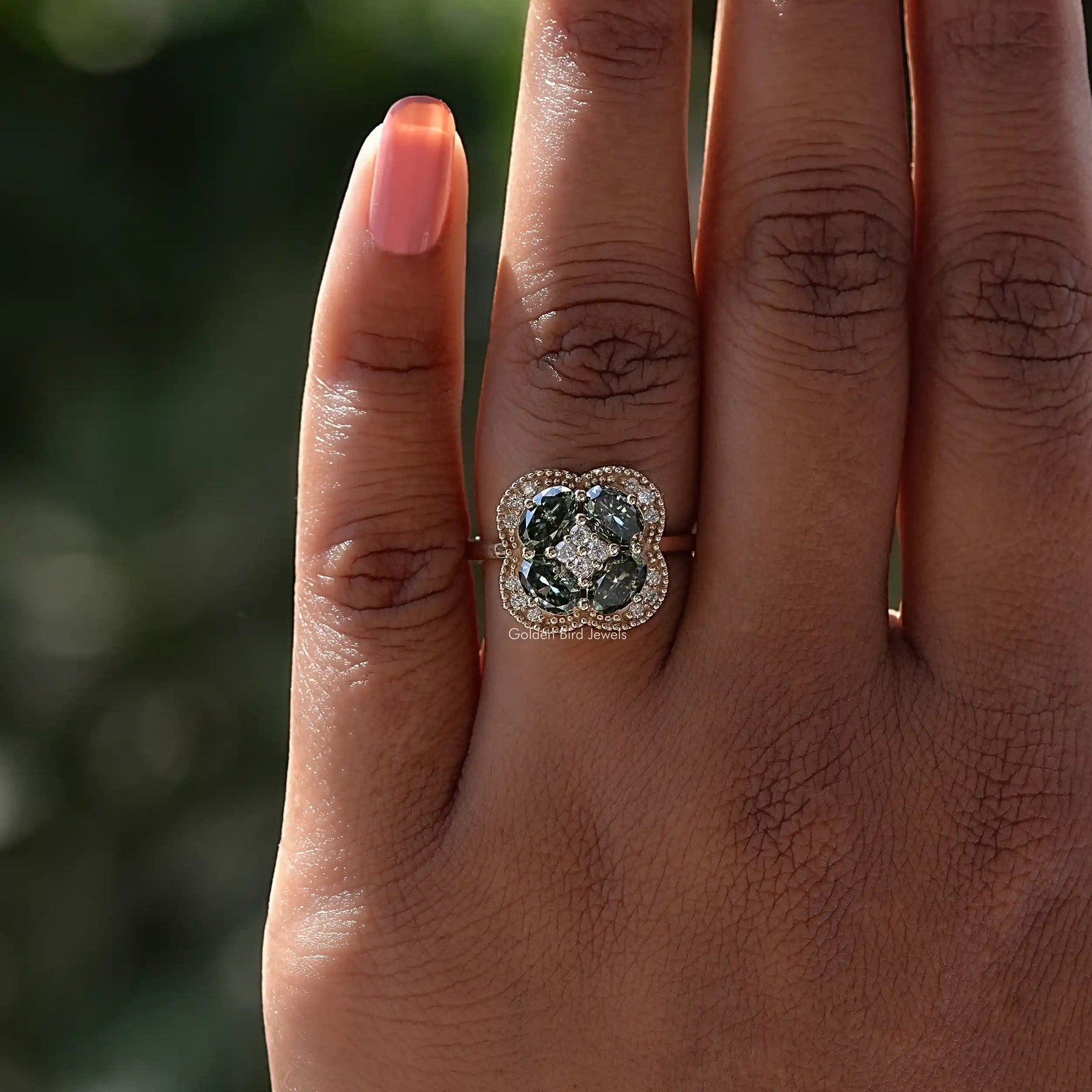 View of Green Oval Cut Moissanite Engagement Ring In Yellow Gold