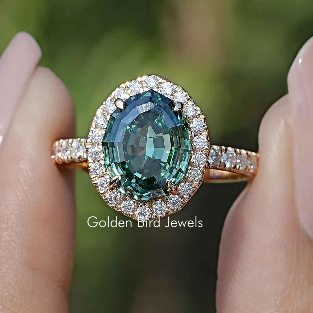 Front view of Step Cut Oval Moissanite Halo Accent Ring