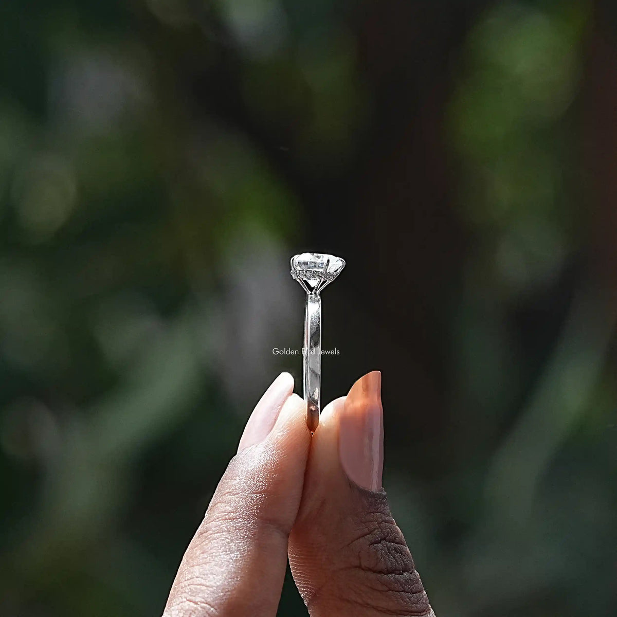 Side View of Heart Cut Hidden Halo Moissanite Ring In finger