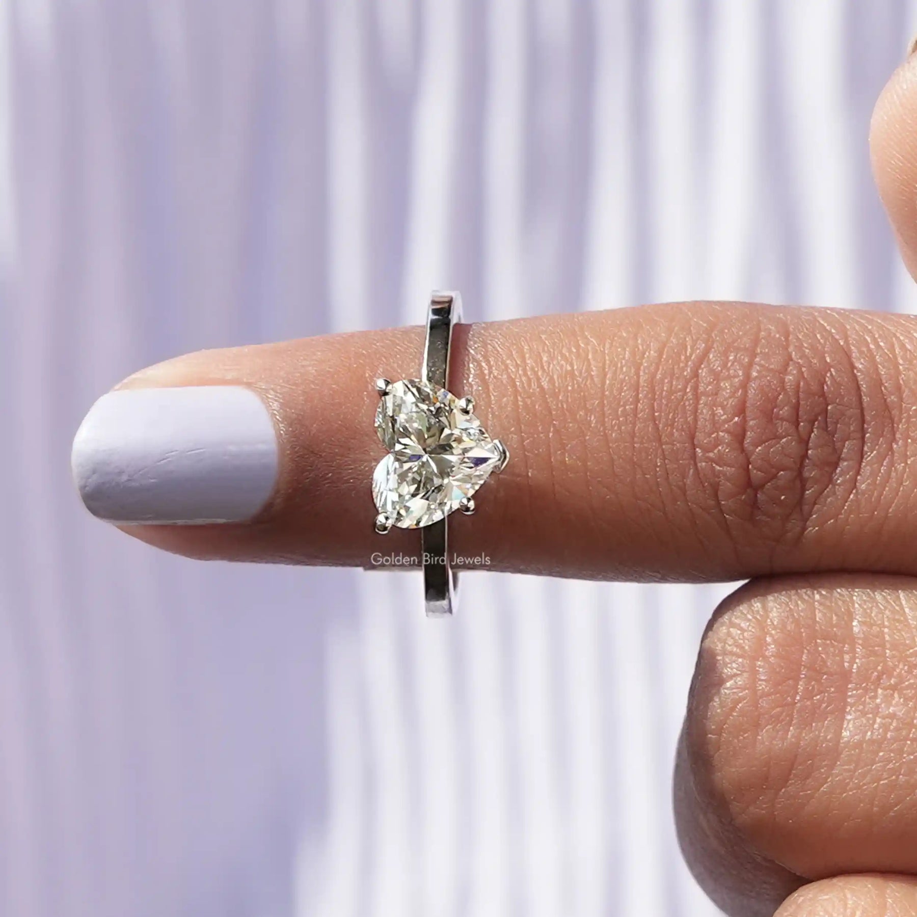 In finger front View of Diamond Heart Shaped Engagement Ring