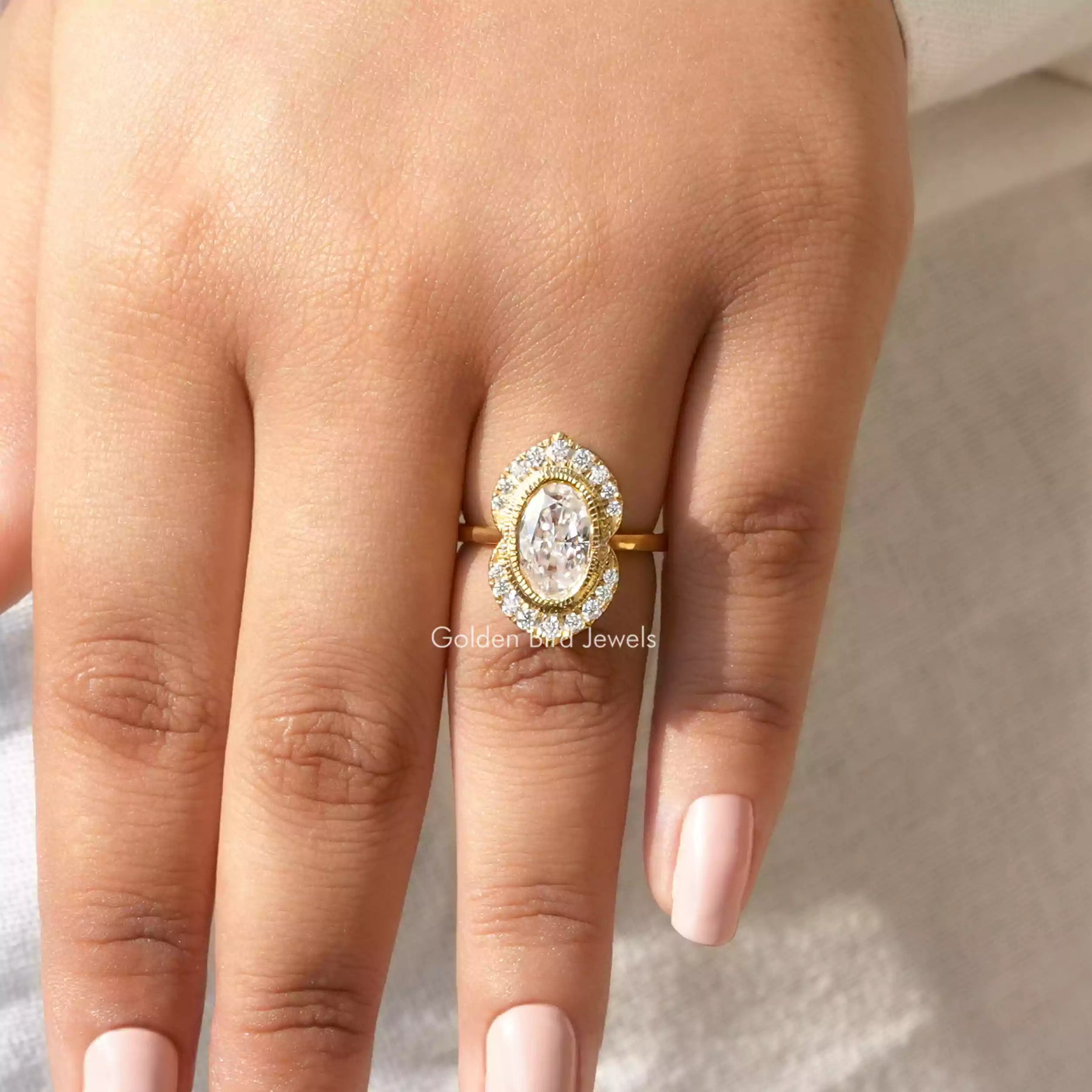 Detailed View Of Crushed Oval Cut Moissanite Engagement Ring In Yellow Gold