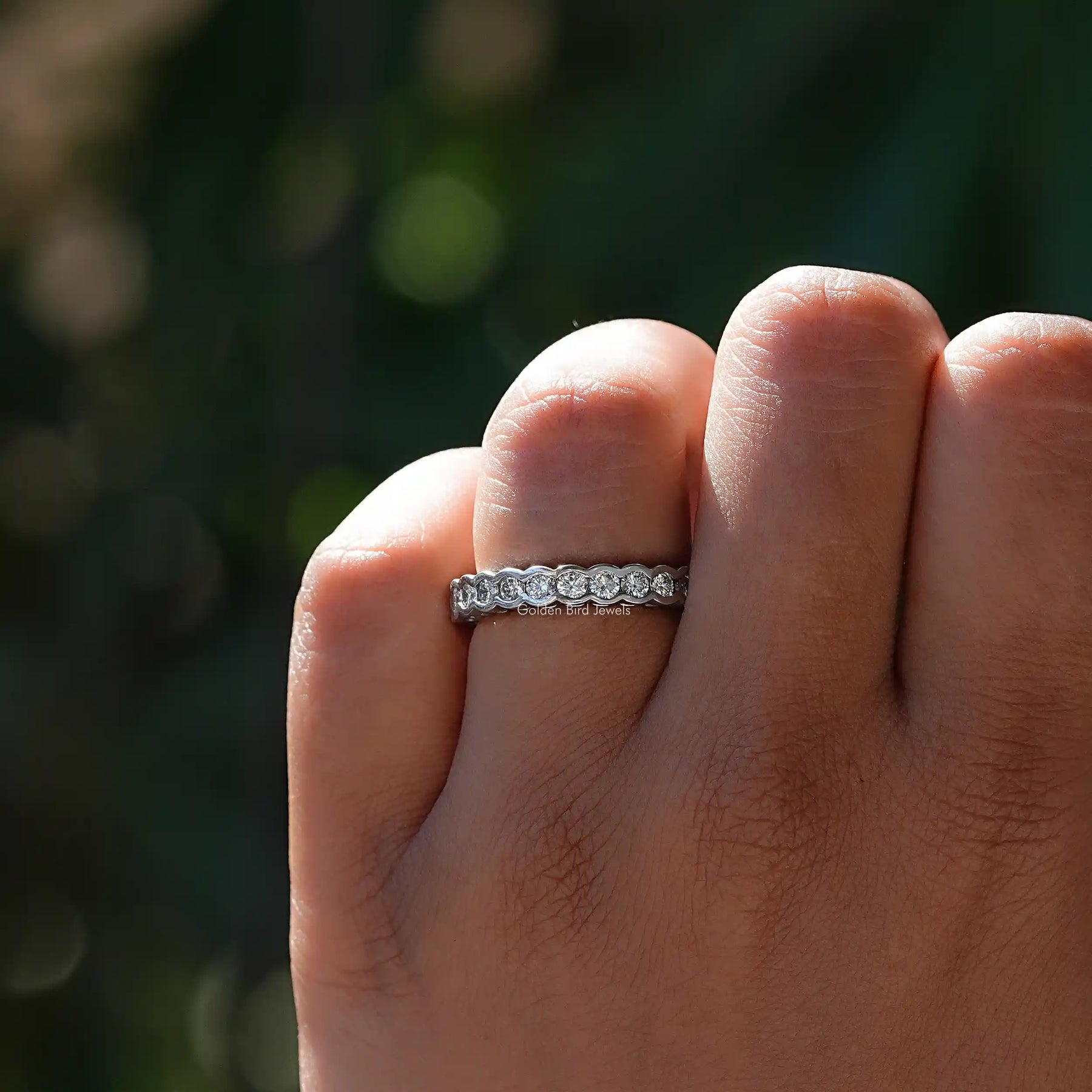 View of Lab Diamond Round Cut Bezel Set Wedding Band In White Gold