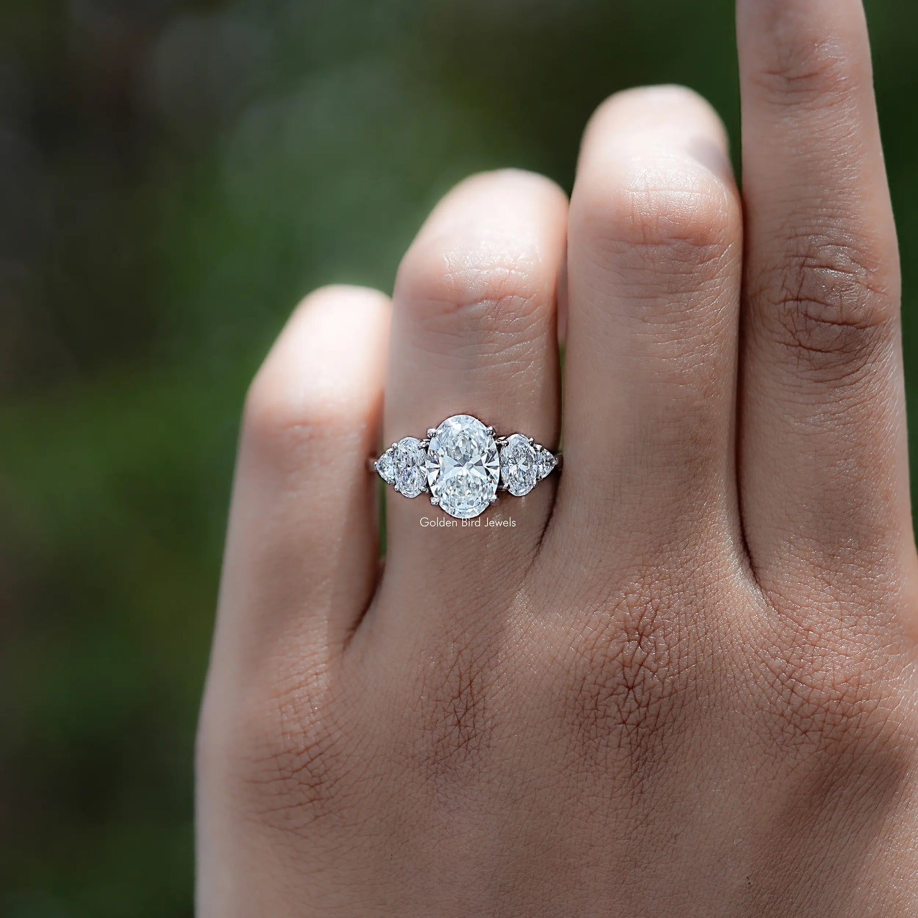 Front view of Oval And Trillion Lab Diamond Five Stone Ring