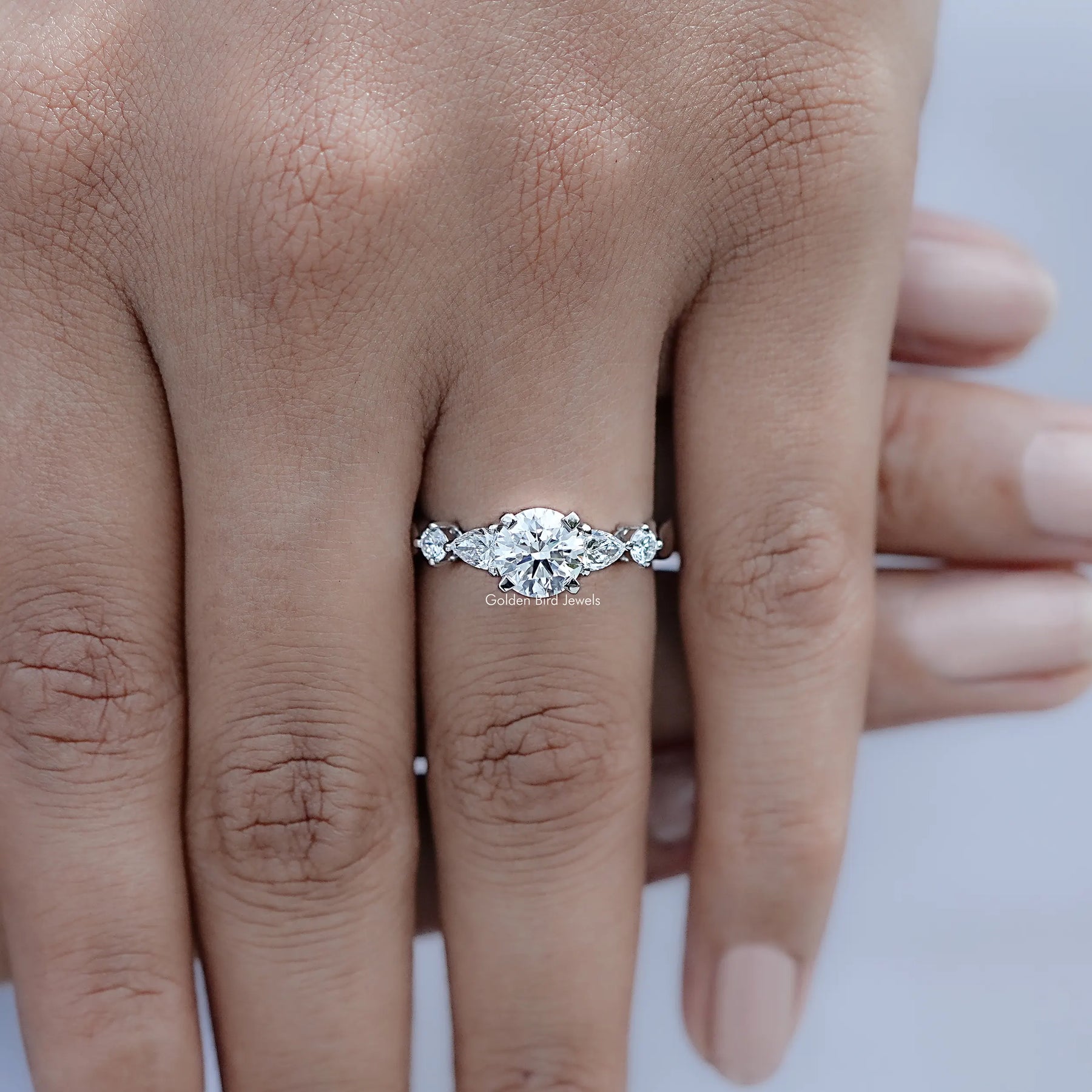 Top view of Round And Pear Cut Lab Diamond Five Stone Ring
