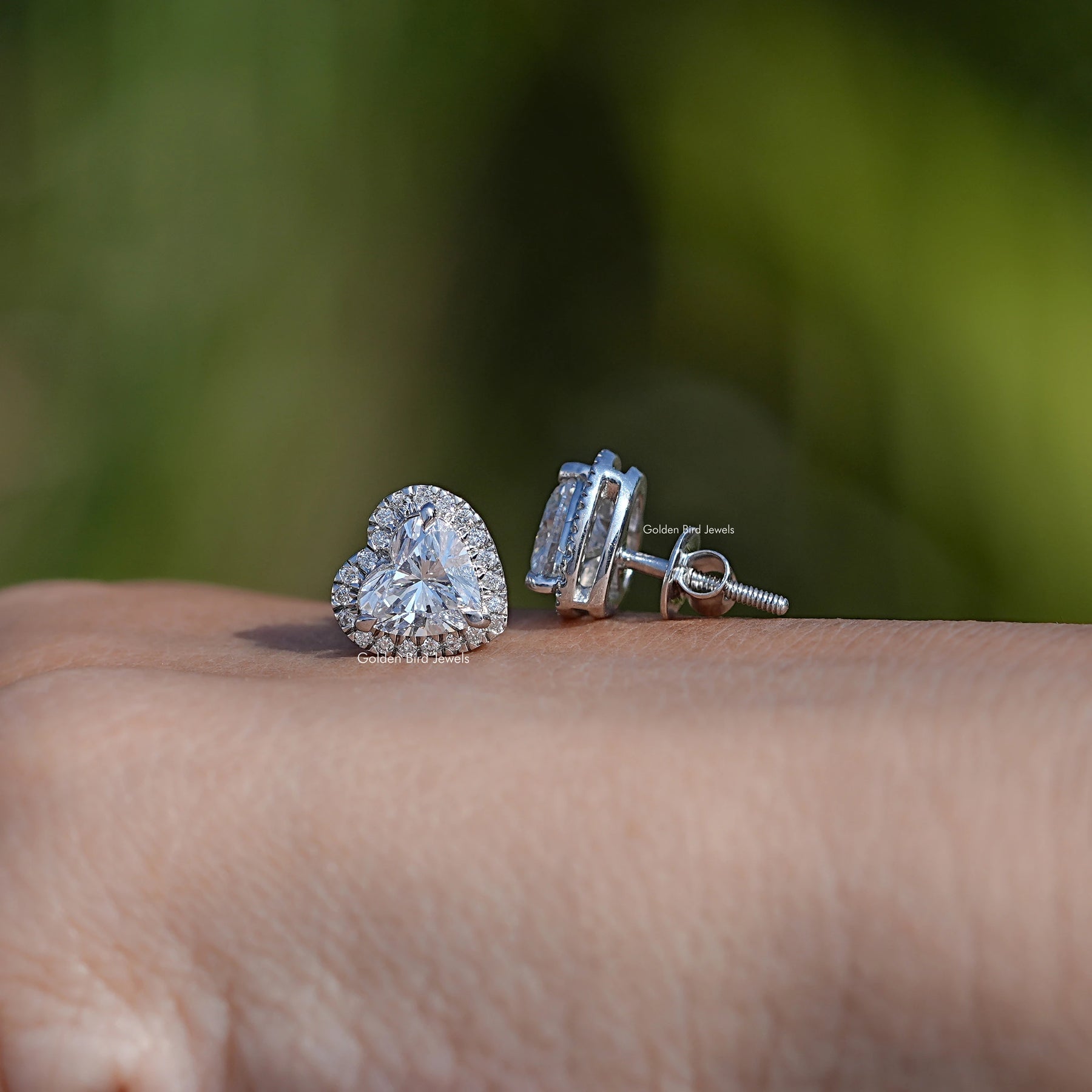 Front And Back Side View Of solitaire stud earrings crafted In White Gold