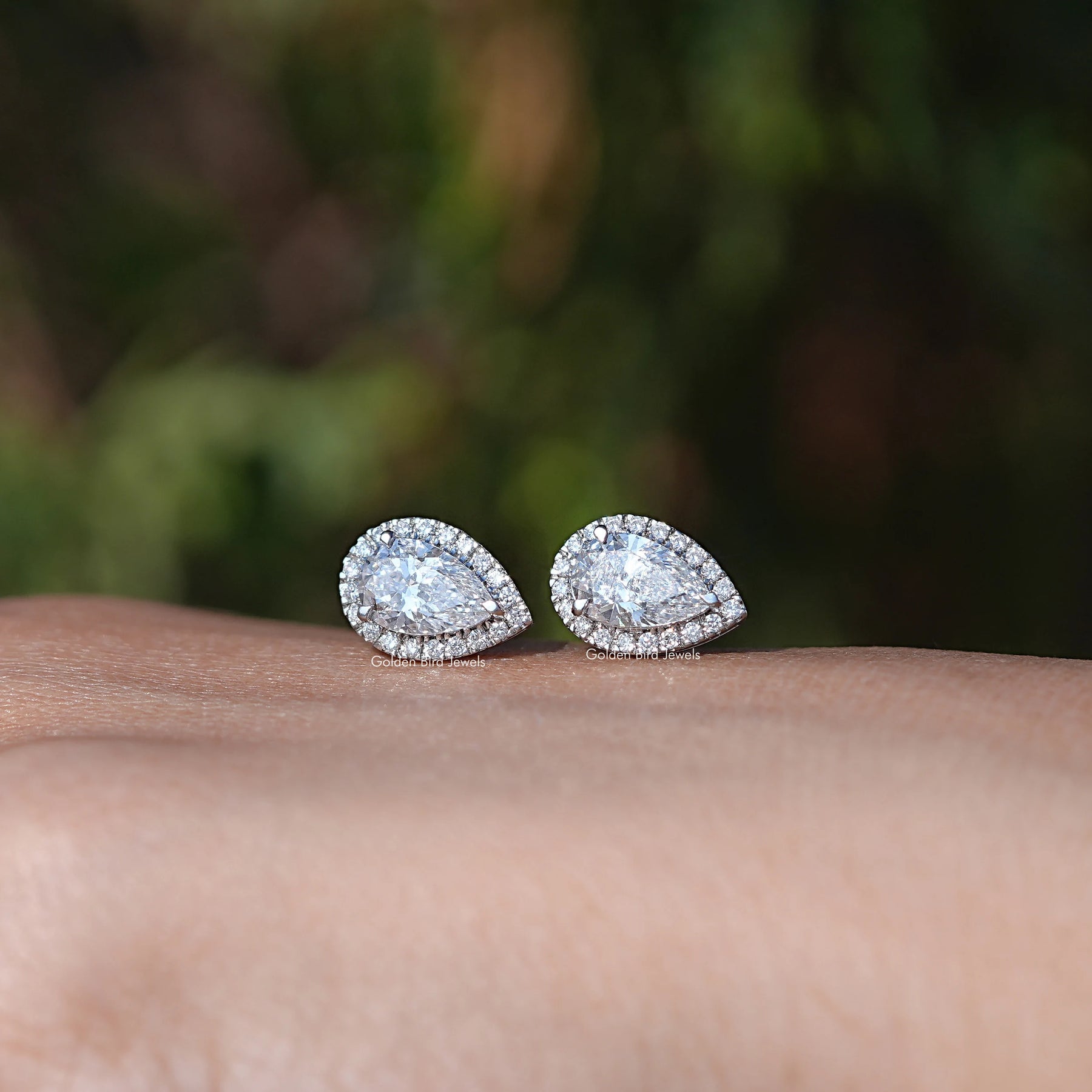 In Hand View Of Round cut Diamond Stud Earring In White Gold