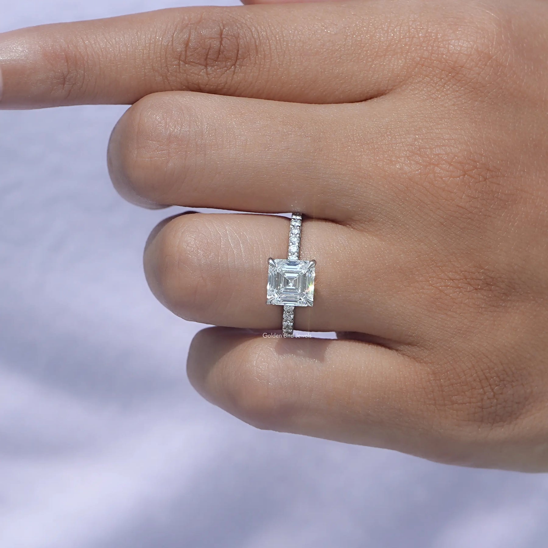 White Gold Emerald Cut Diamond Ring in prong setting