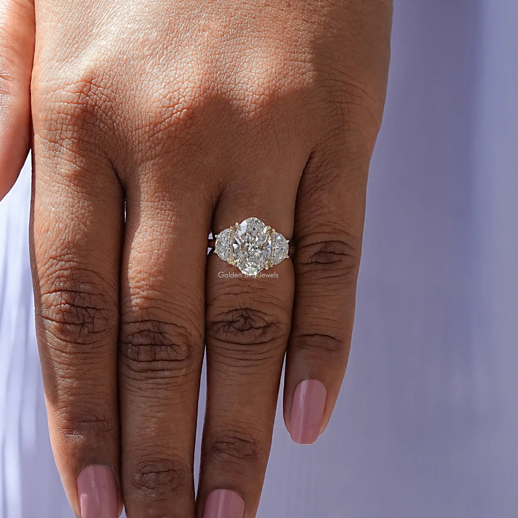Close view of Oval Cut Diamond Accent Halo Wedding Ring