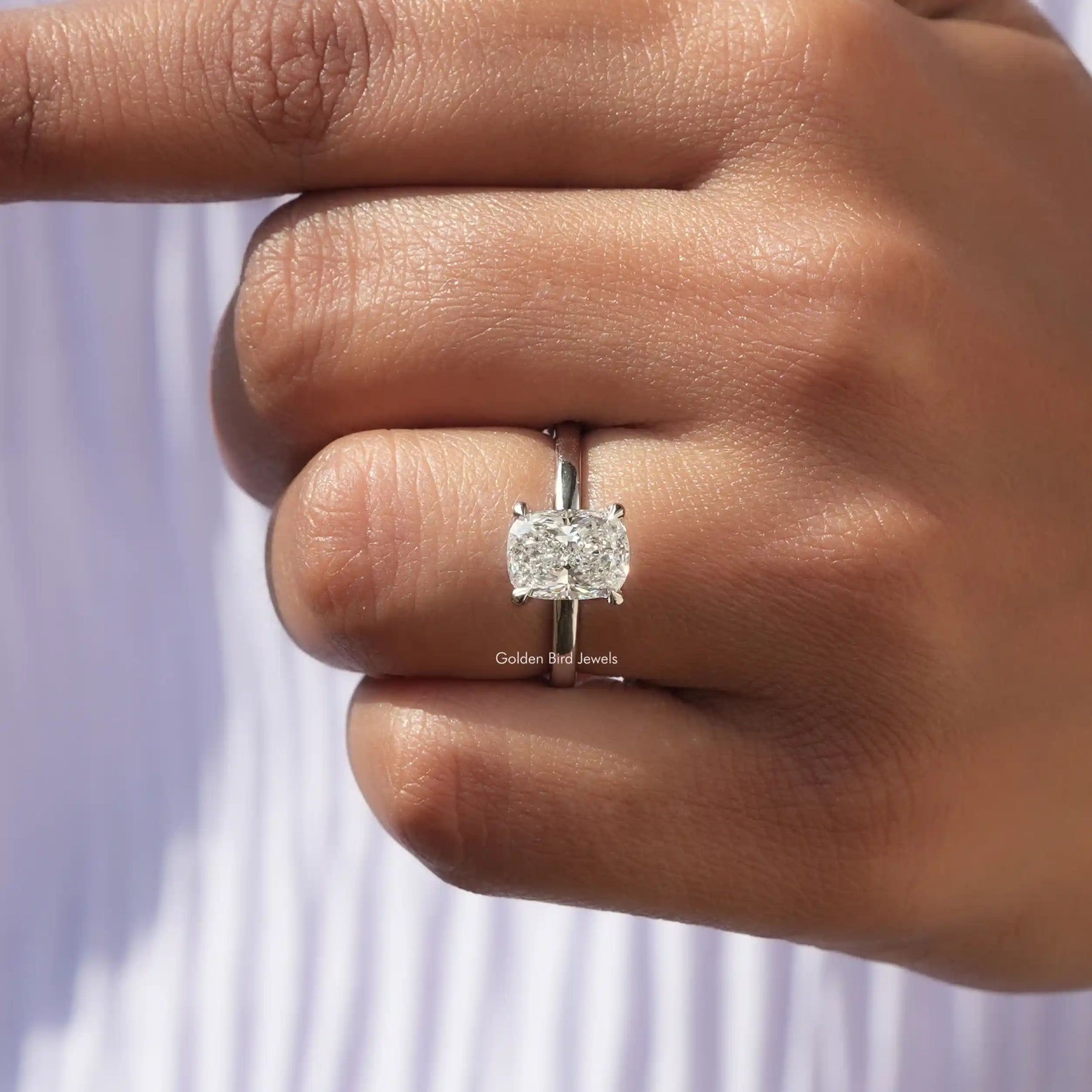 Close-Up View of Cushion Cut Diamond Solitaire Engagement Ring In White Gold