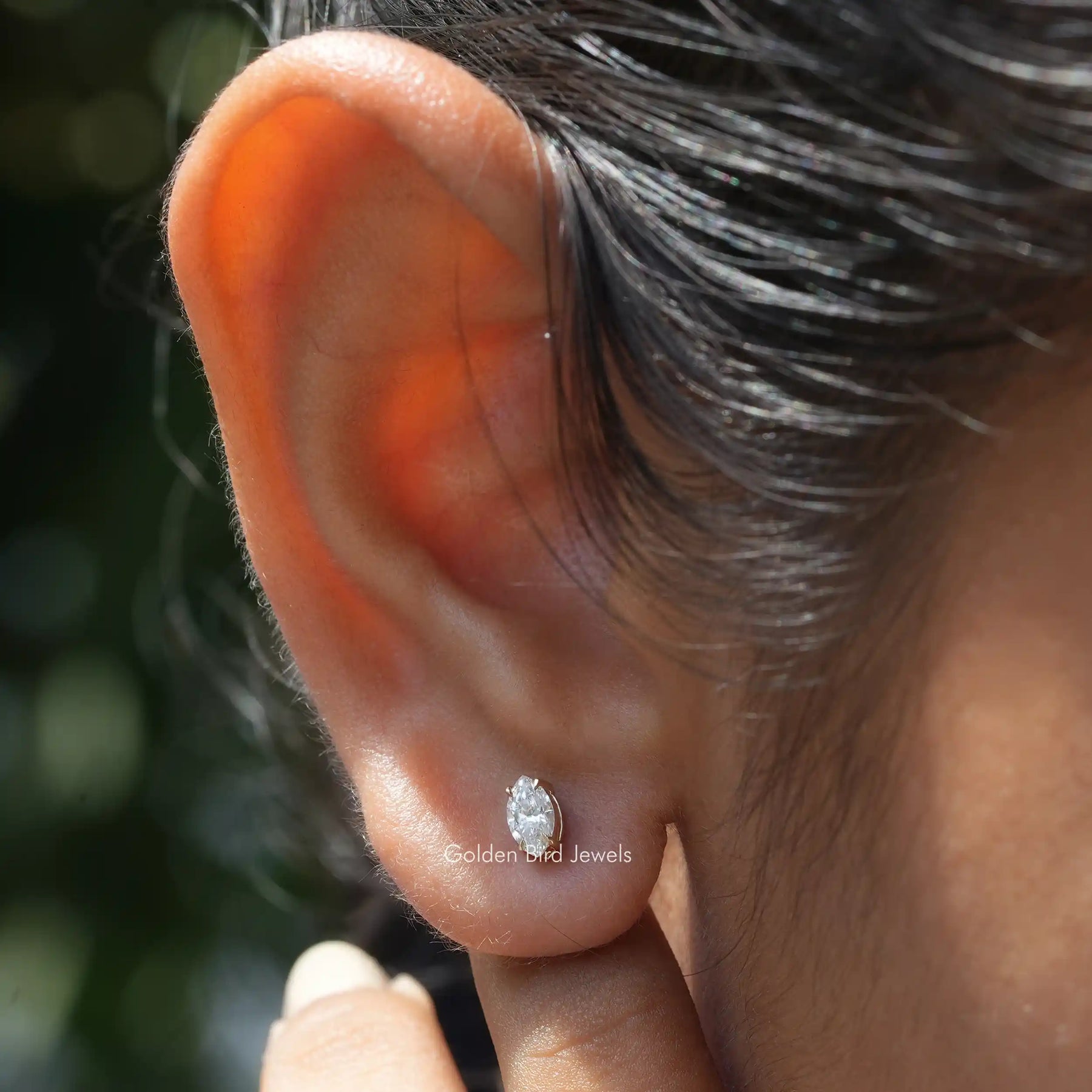 This marquise cut lab grown diamond earrings set in 4 prongs