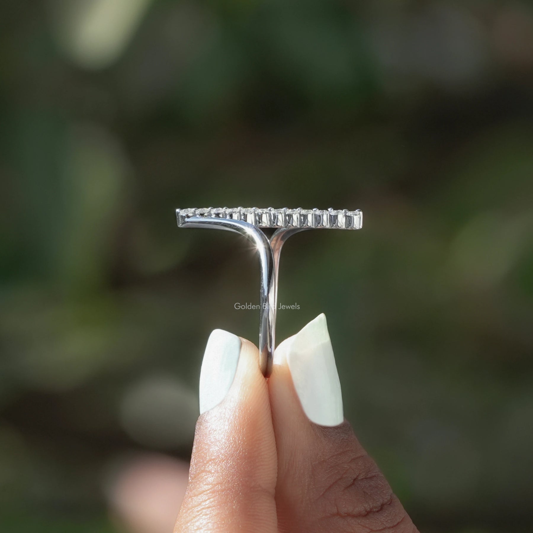 Side View of  Round Cut Vertical Bar Bypass Ring In two fingers