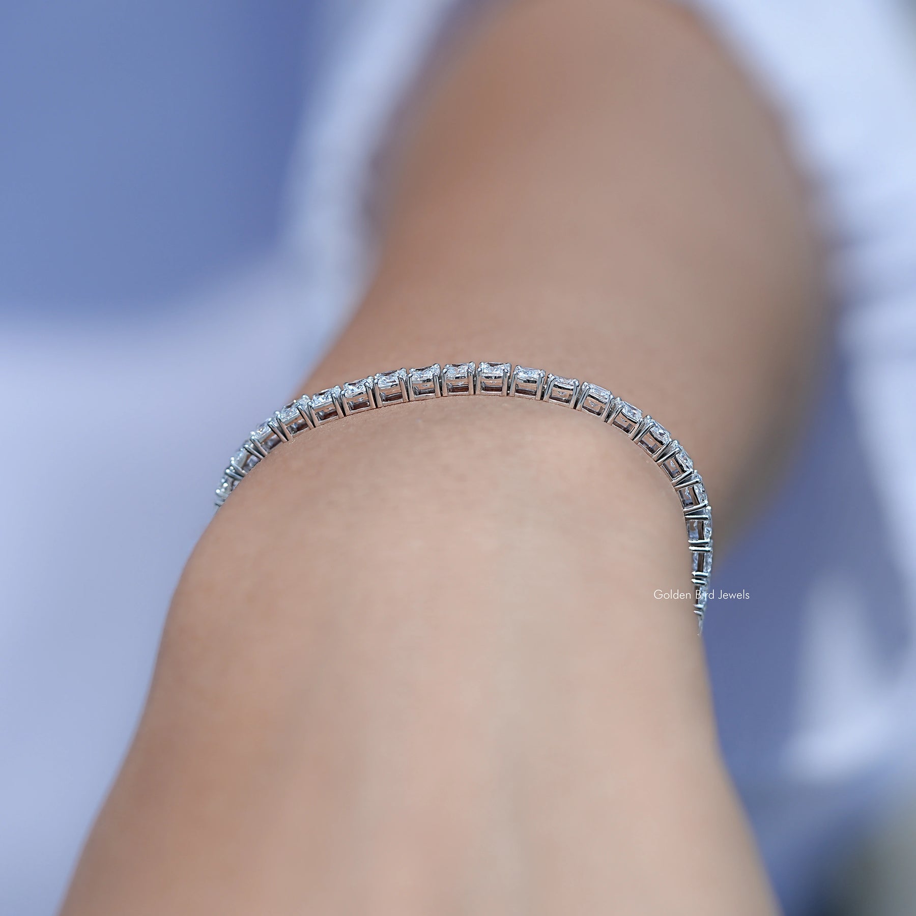 In hand Showing View of Cushion Cut Diamond Tennis Steel Bracelet