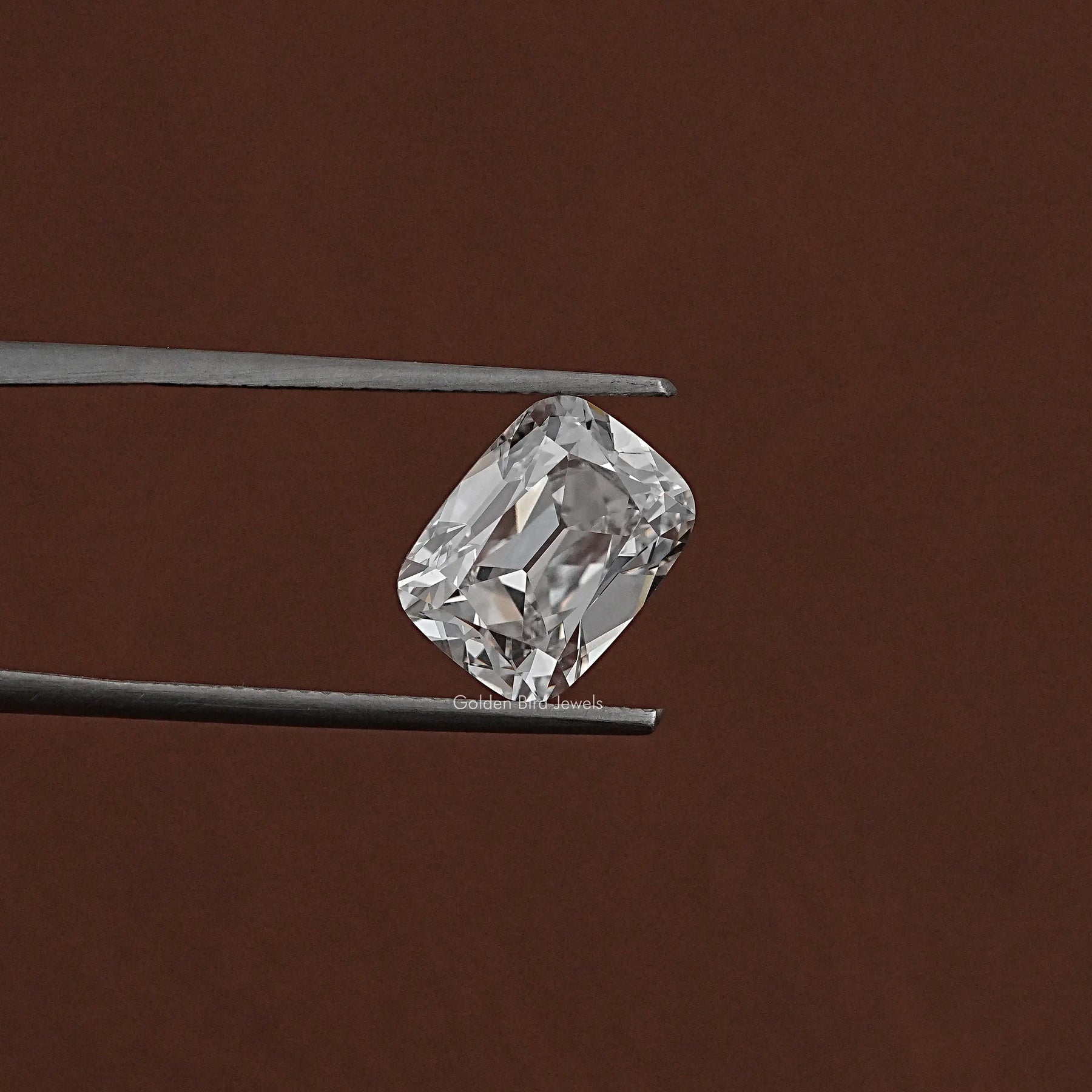 In Tweezer View Of Lab Grown Old Mine Cushion Shaped Diamond