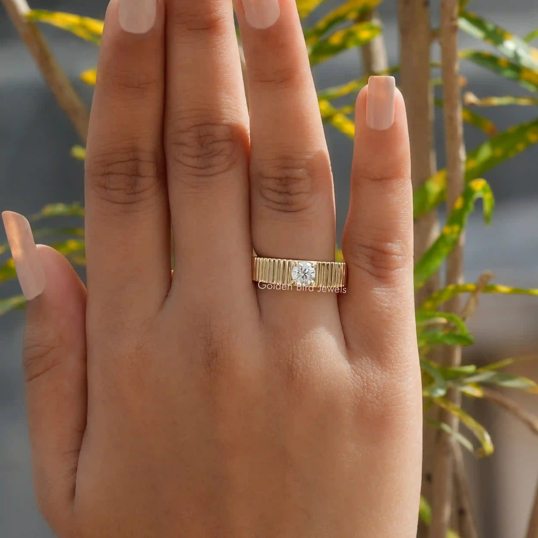 View of Round Cut Solitaire Engagement Ring In Finger
