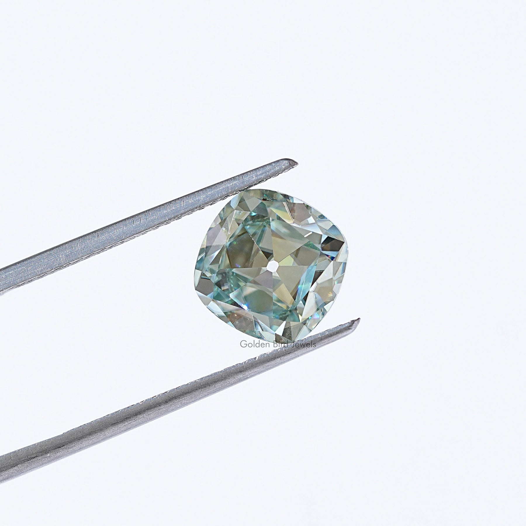 View Of Light Blue Old Mine Cushion Cut Loose