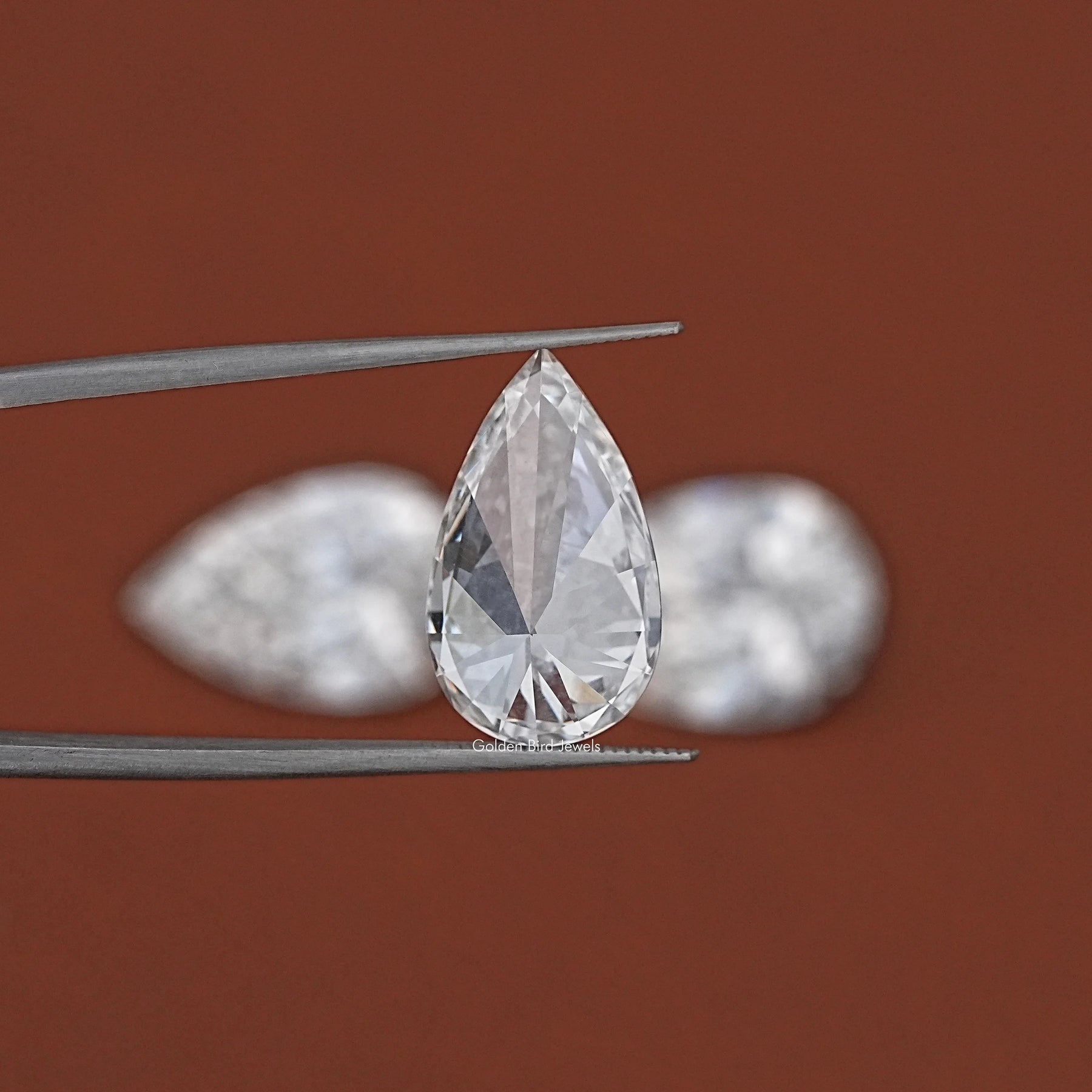 Detailed View Of Pear Shaped Loose Lab Diamond in Unique Pattern