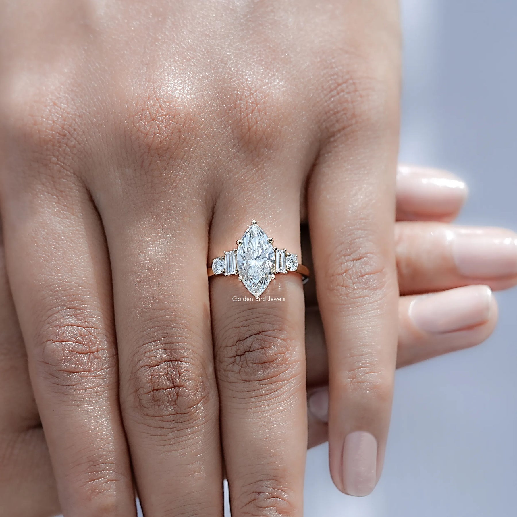 Display view of Marquise And Baguette Diamond Five Stone Ring