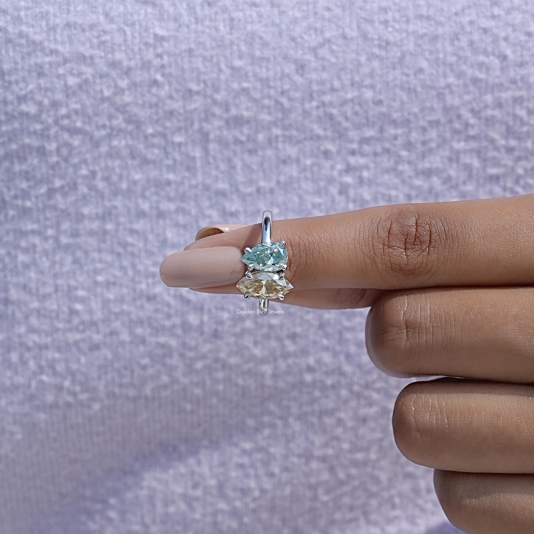 Close view of moissanite ring in secure setting