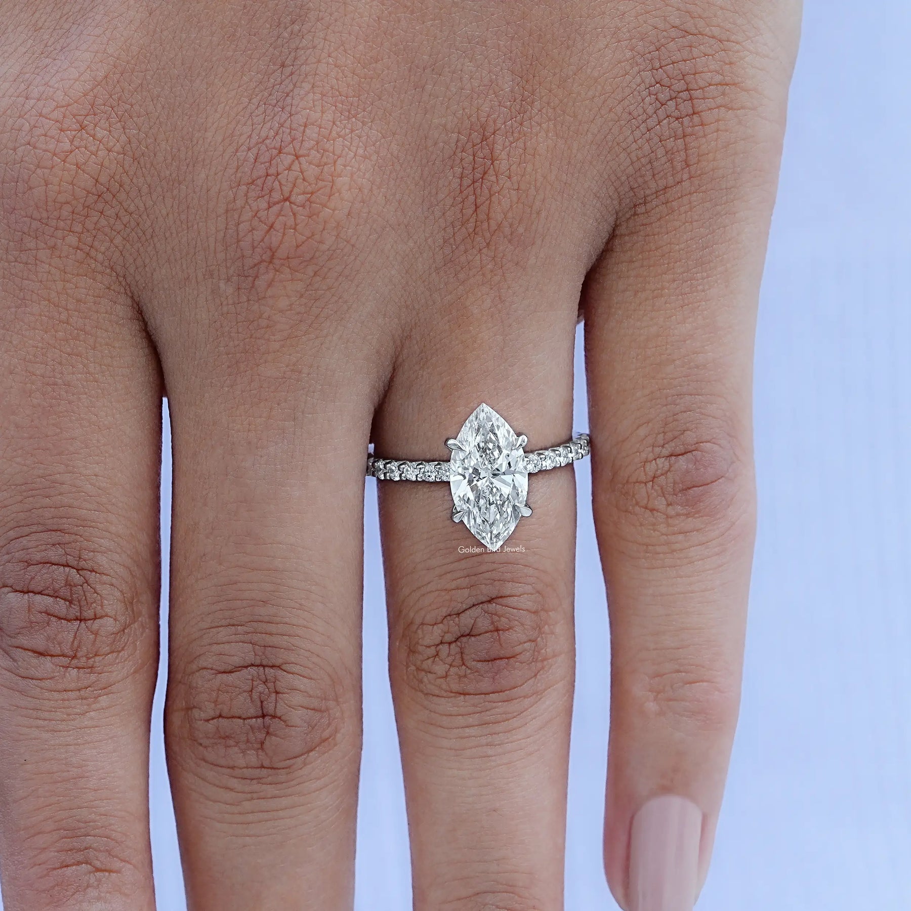 Marquise Cut Solitaire Diamond Ring In finger