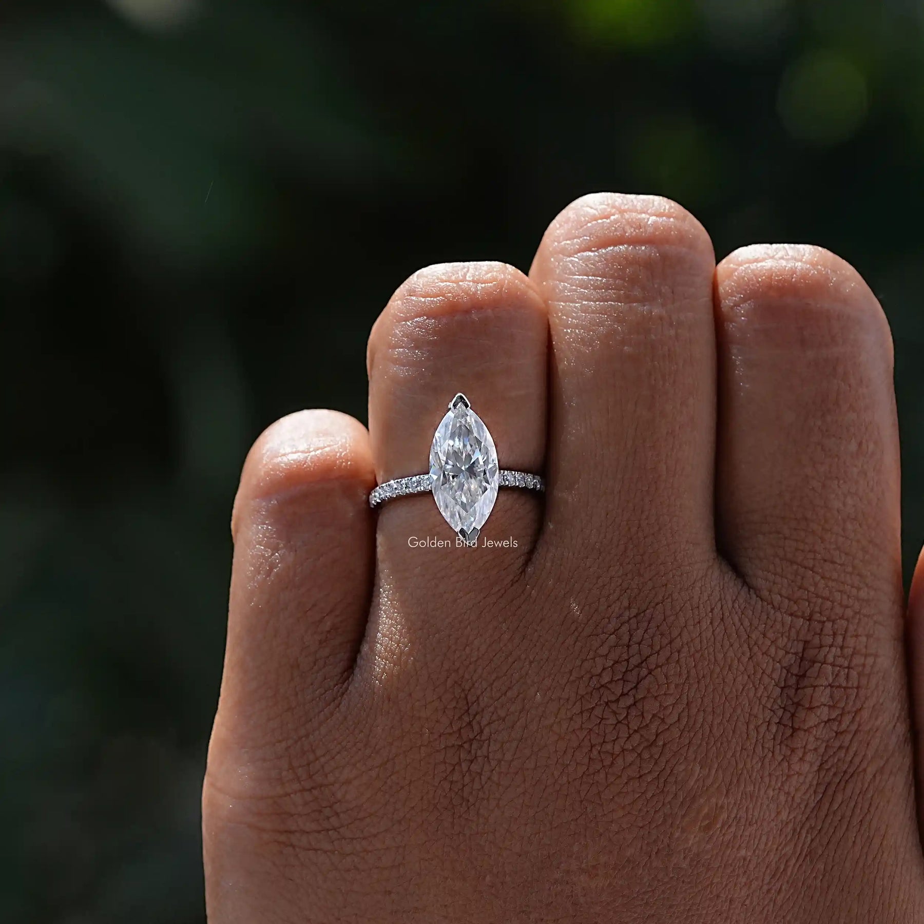 Close-Up View of Colorless Marquise Cut Ring Set In White Gold
