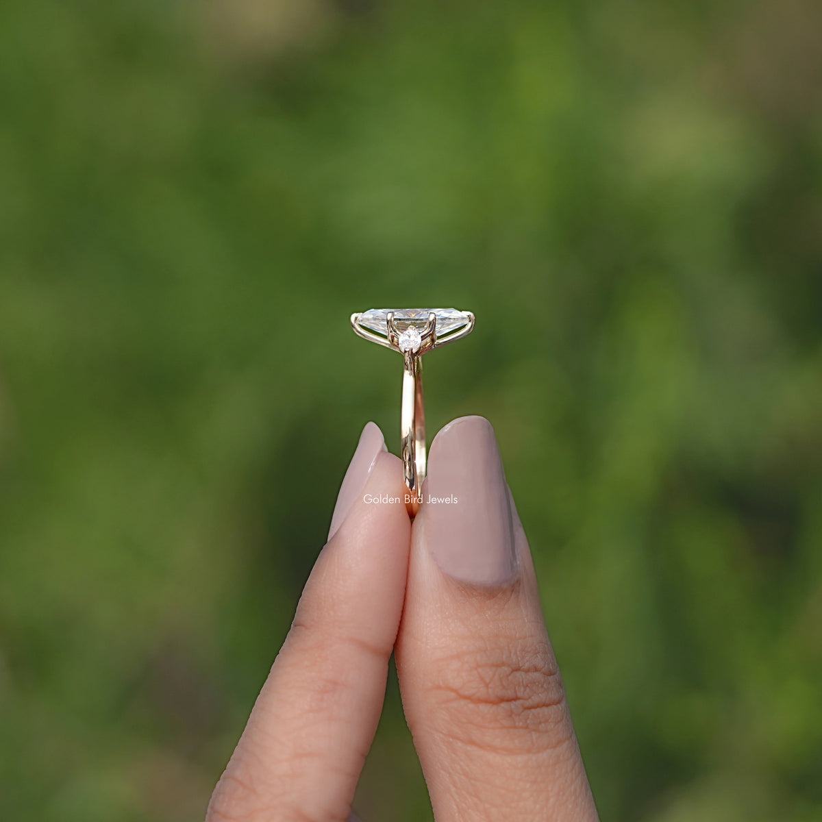 Side View of Marquise Cut Moissanite Three Stone Ring