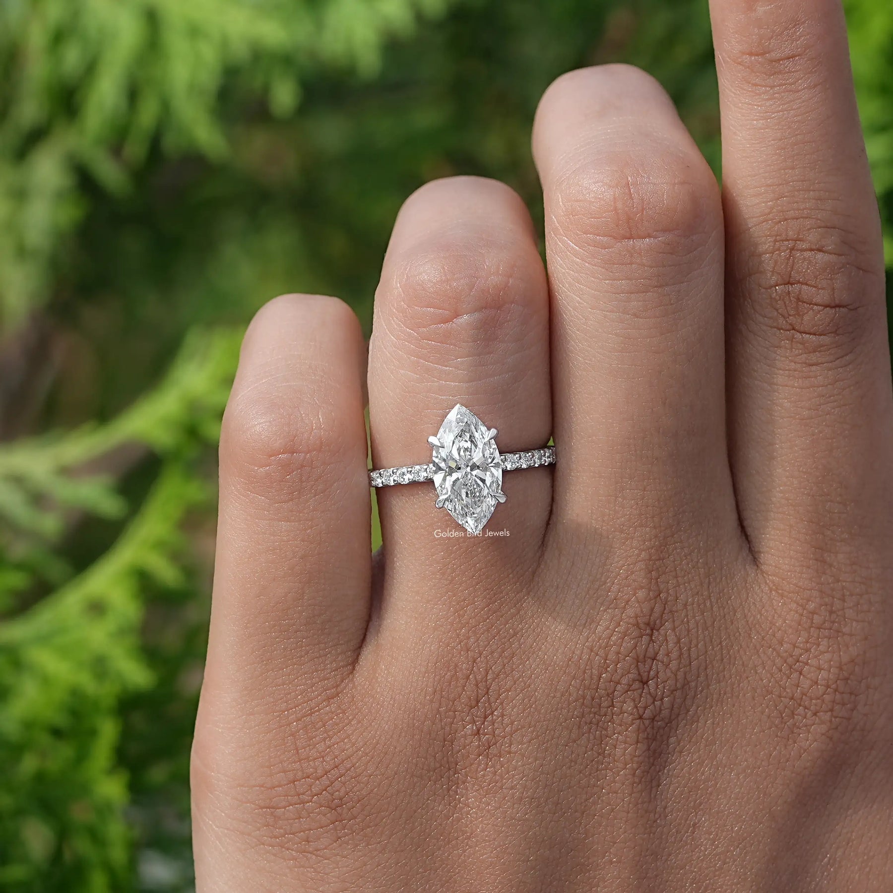 In finger front View of Marquise Cut Diamond Solitaire Ring