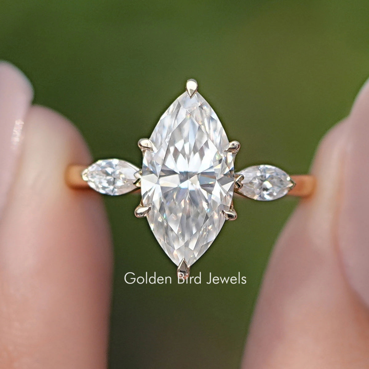 Front view of Marquise Cut Moissanite Three Stone Ring