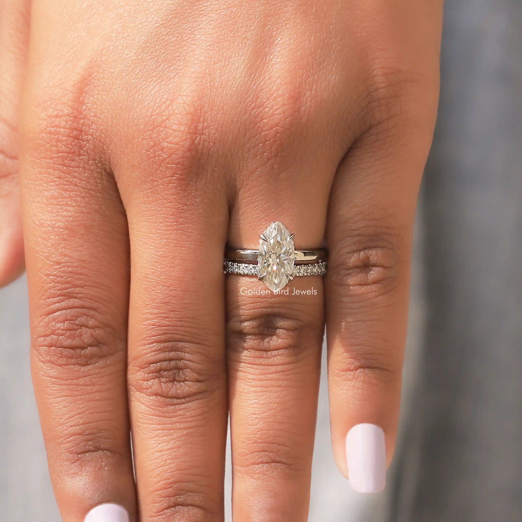 View of Marquise Moissanite Halo Bridal Wedding Ring In Finger