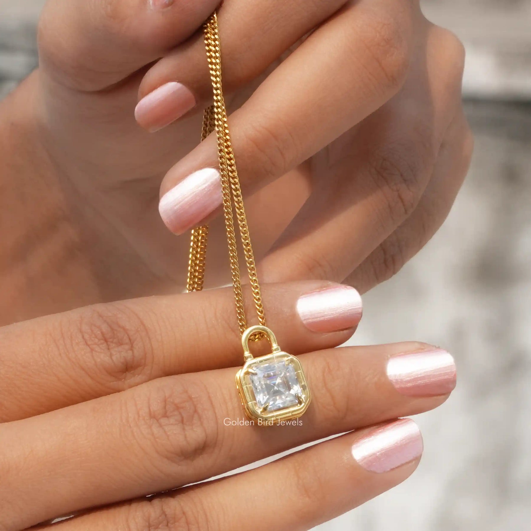 Side view of Asscher Cut moissanite In yellow Gold
