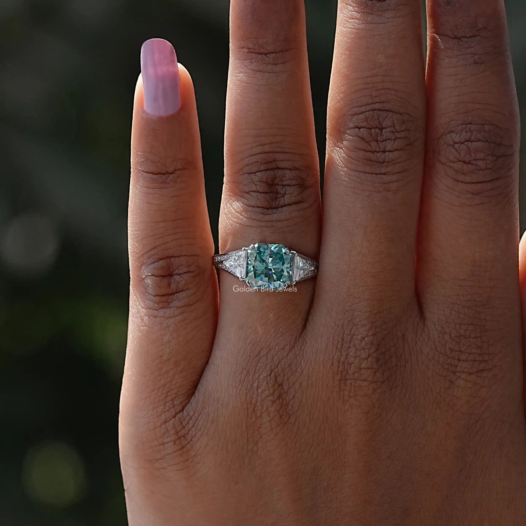 Close-Up View of Blue Radiant Cut Moissanite Accent Stone Ring
