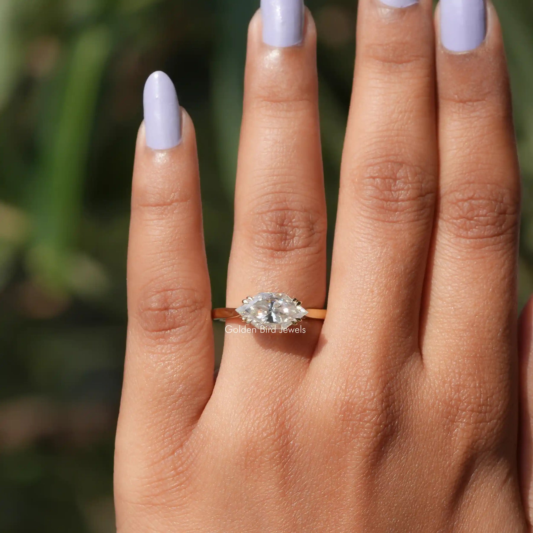 View of Marquise Moissanite East West Solitaire Ring In Finger