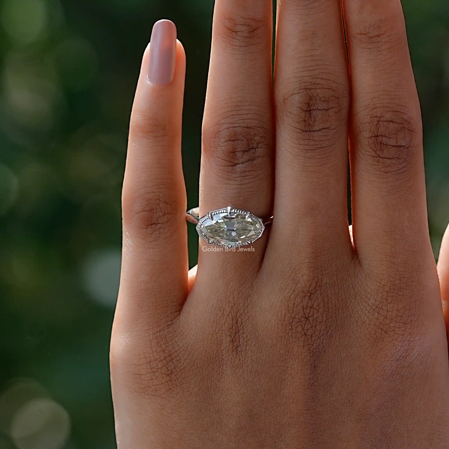 View of Moval Cut Moissanite Solitaire Ring In finger