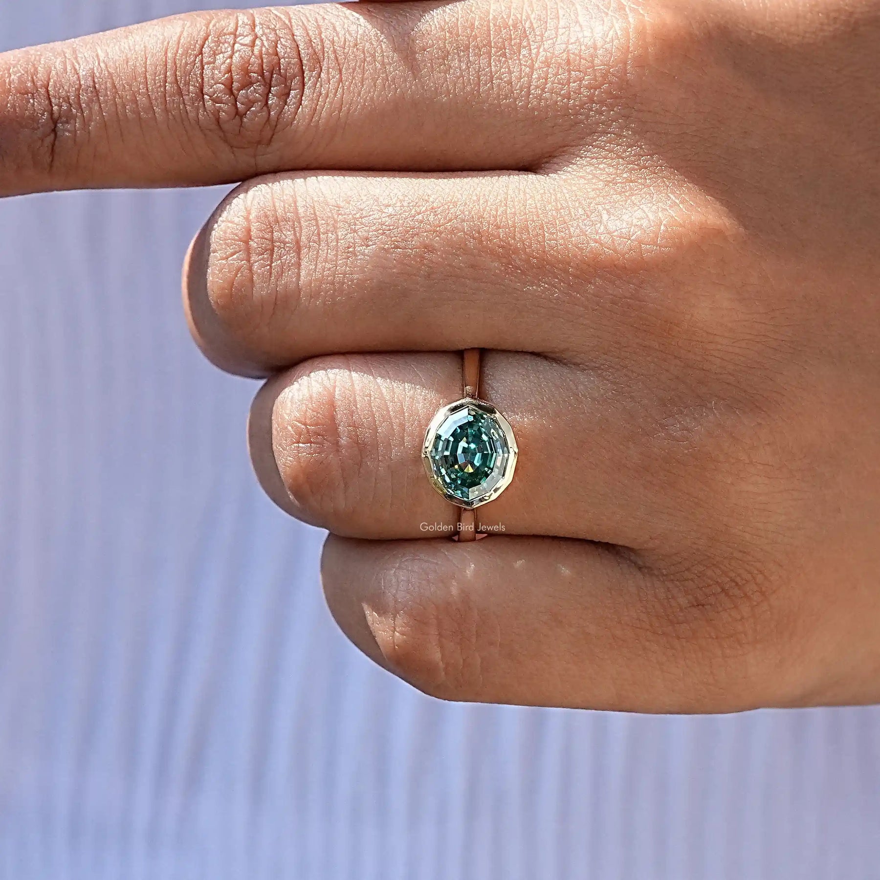 View of East West Oval Cut Moissanite Ring Set In finger
