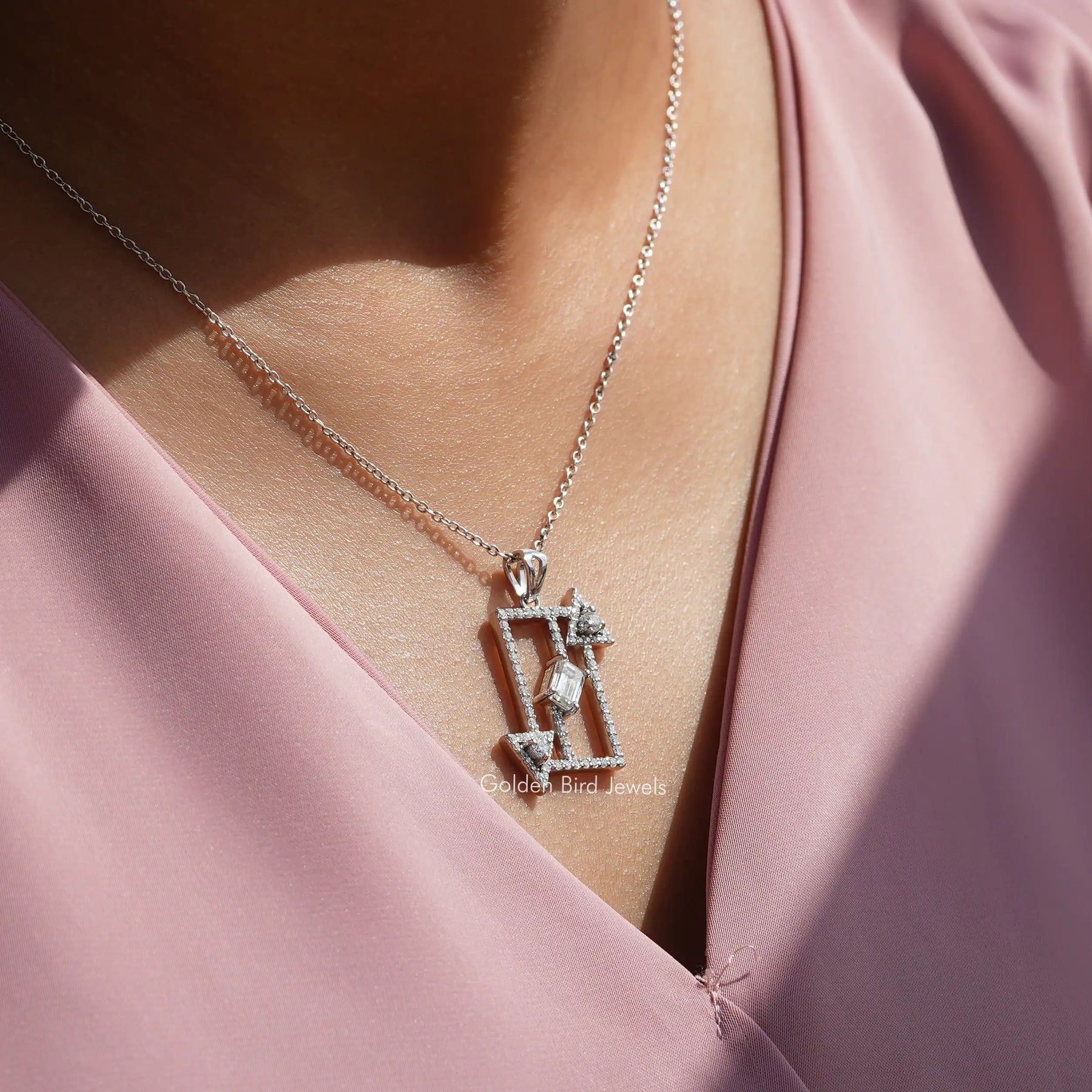 In neck front view of moissanite emerald cut pendant
